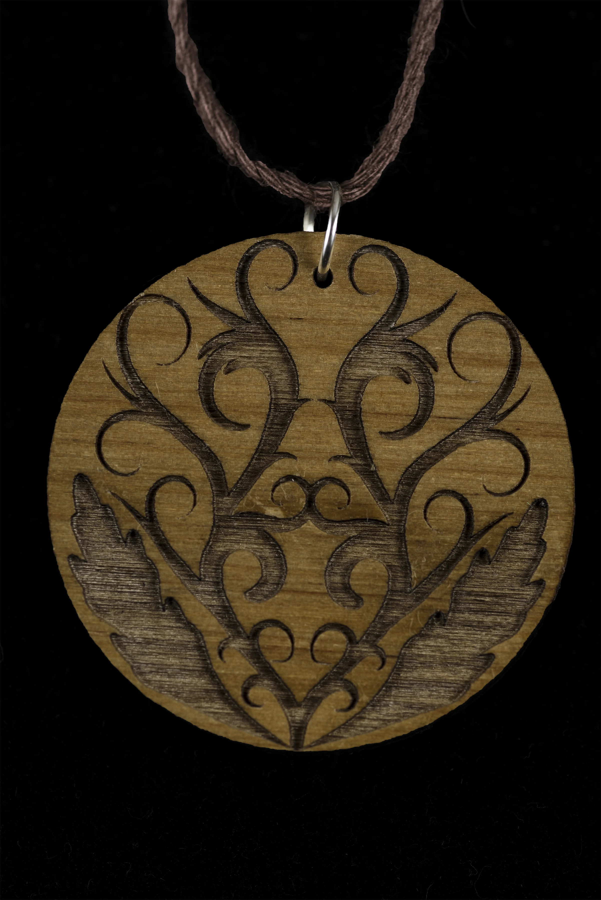 Custom laser engraved scrollwork wood necklace