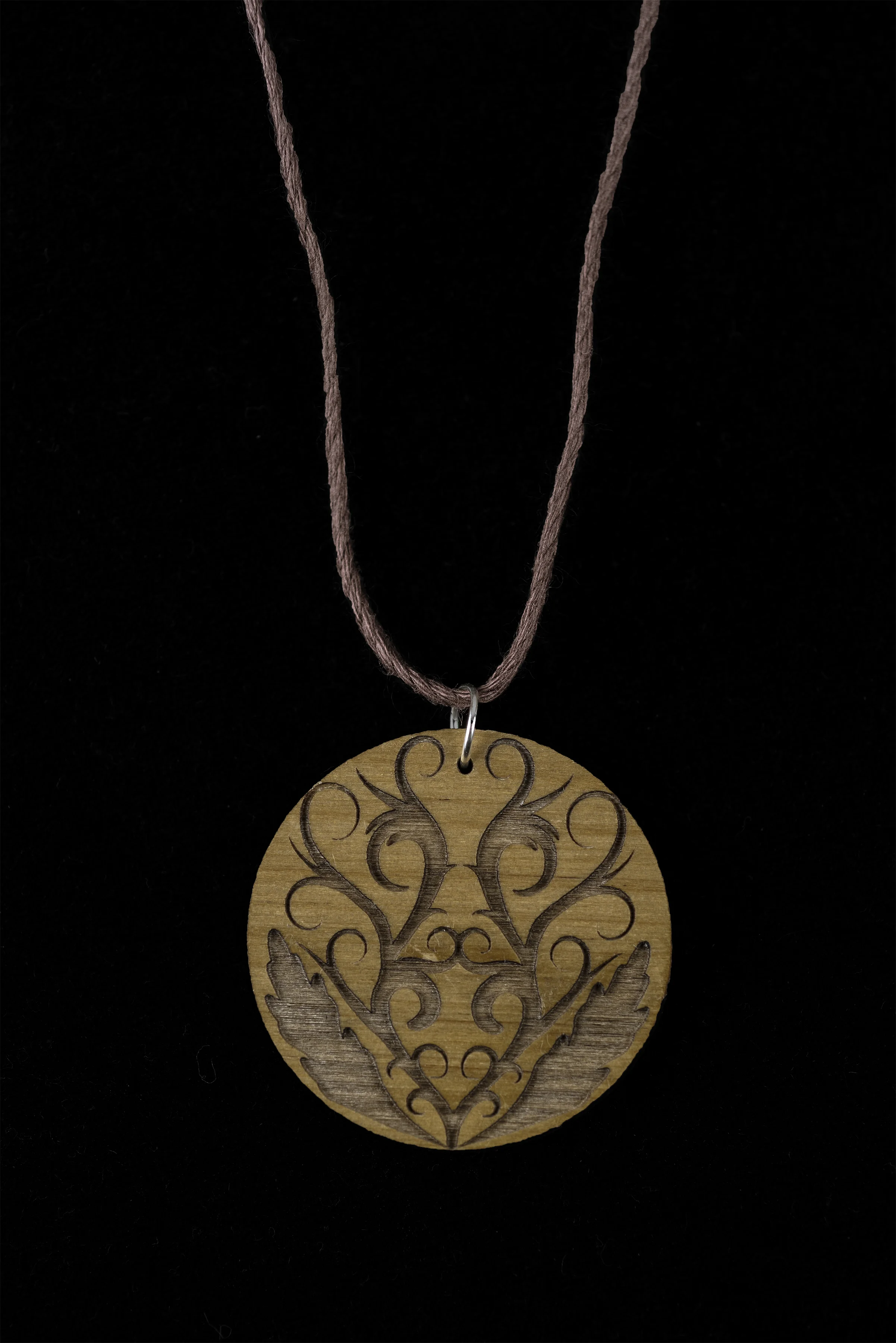 Custom laser engraved scrollwork wood necklace