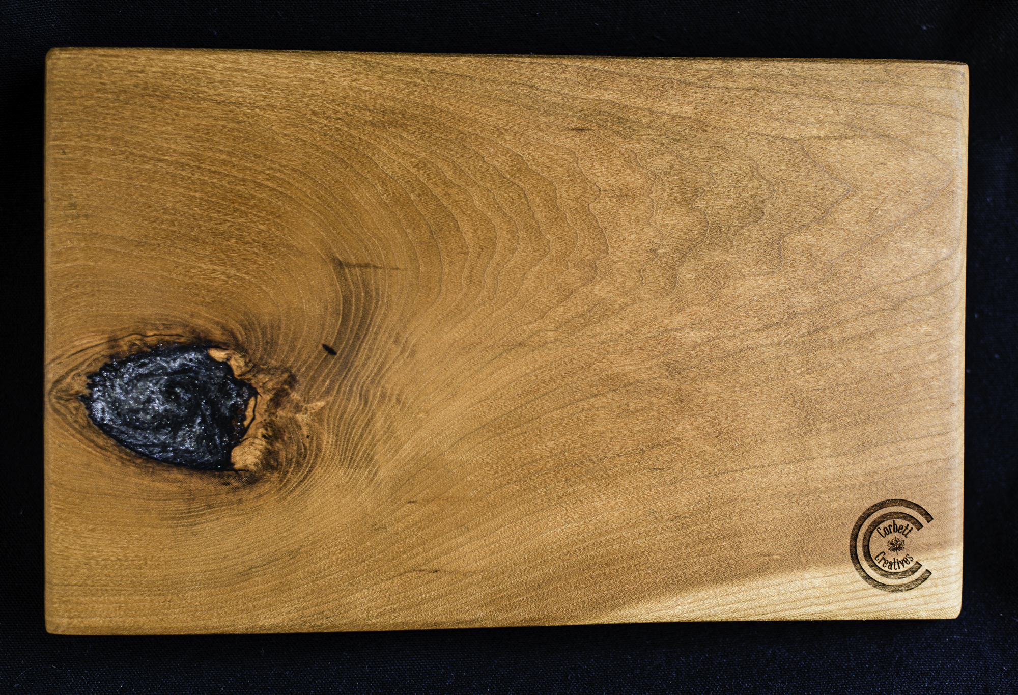 Custom cherry wood cheese board gray epoxy knot