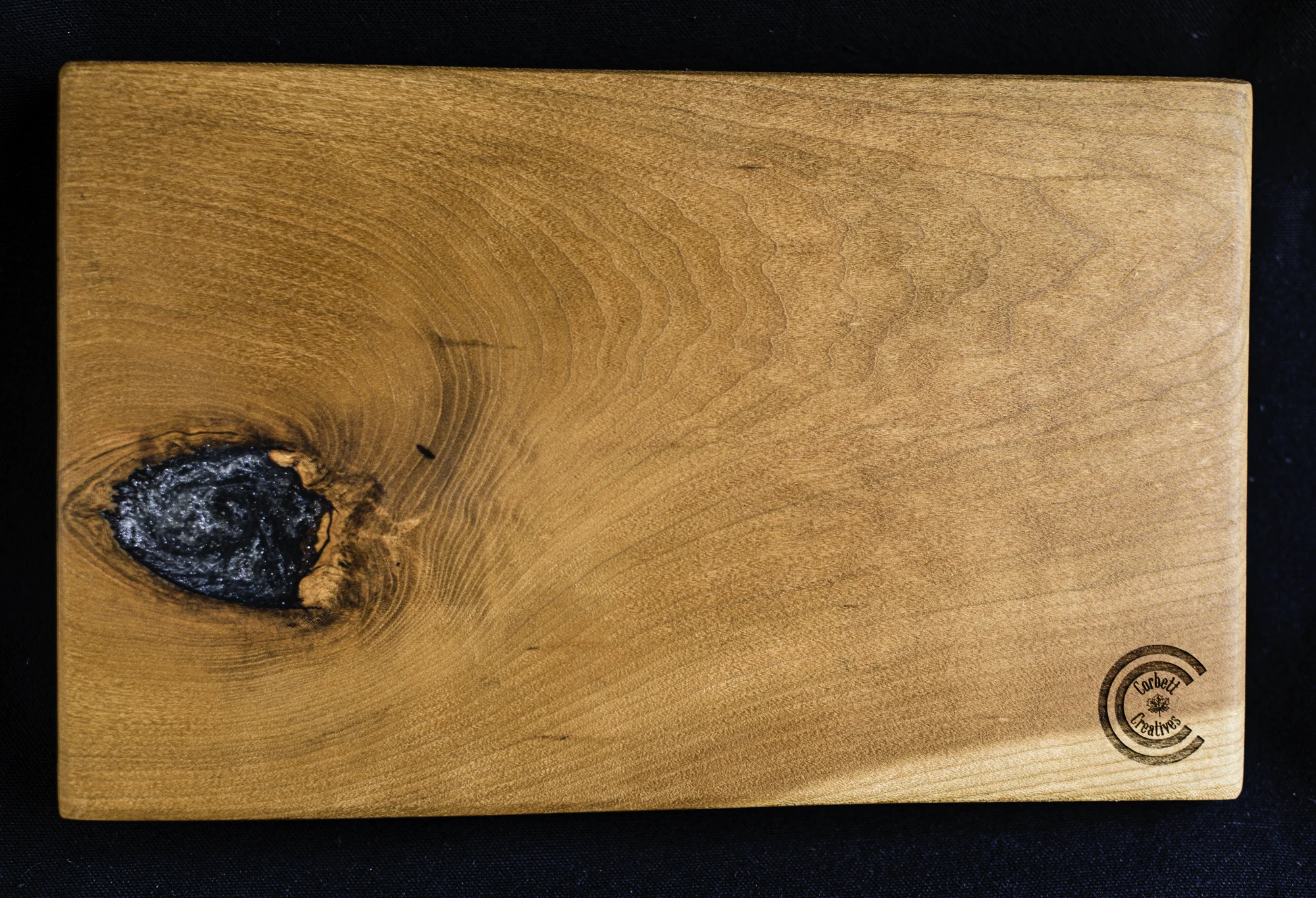 Custom cherry wood cheese board gray epoxy knot