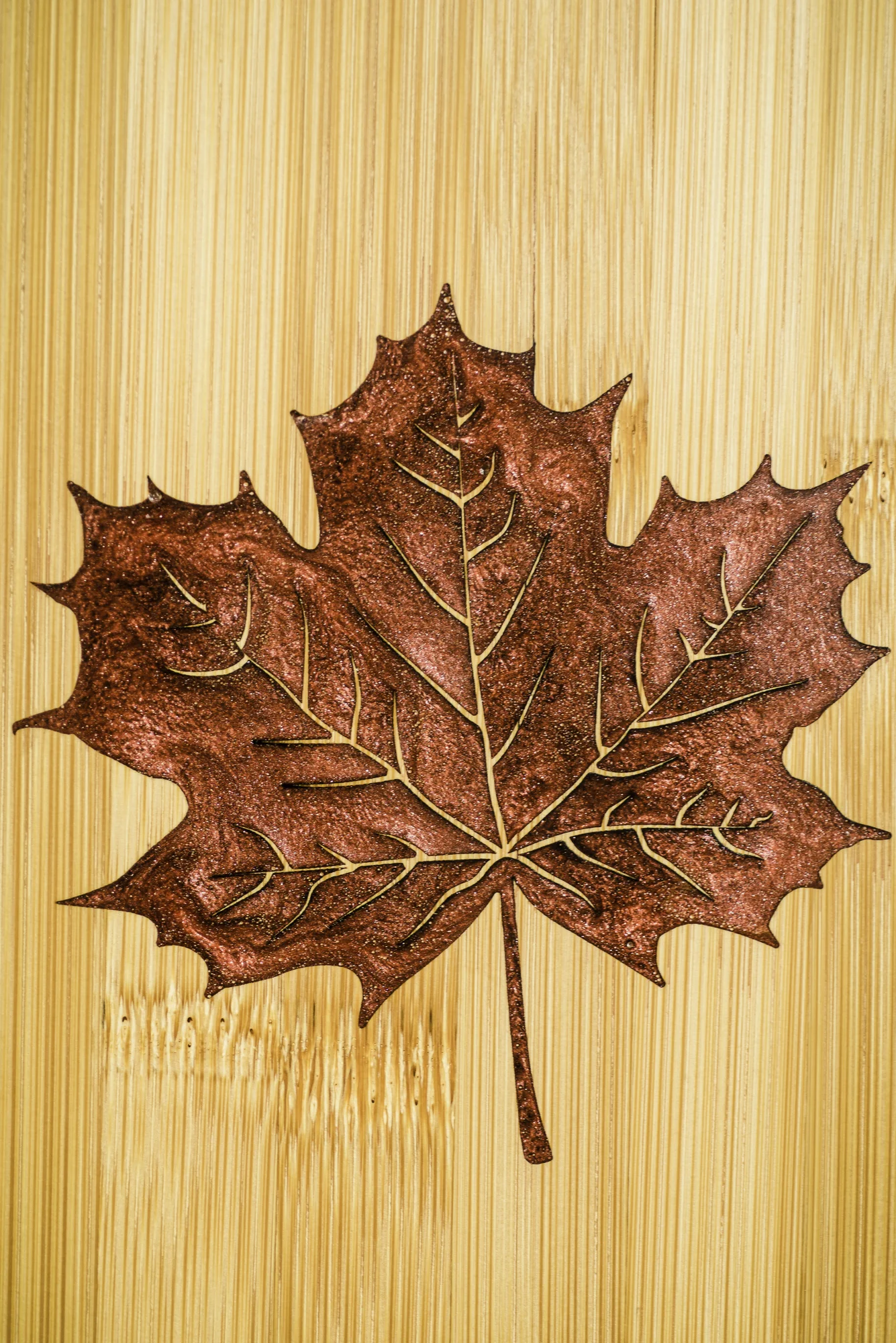 Laser engraved burgundy epoxy filled maple leaf custom serving board