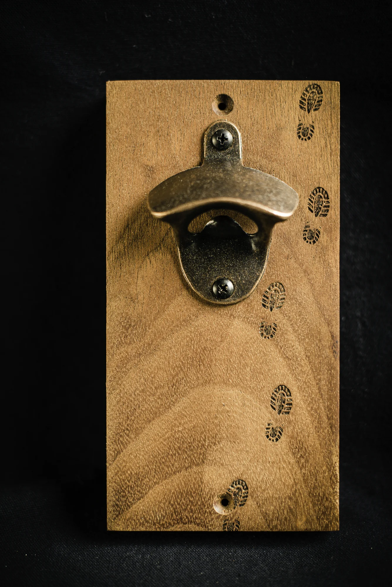Magnetic sapele bottle opener laser engraved running foot prints