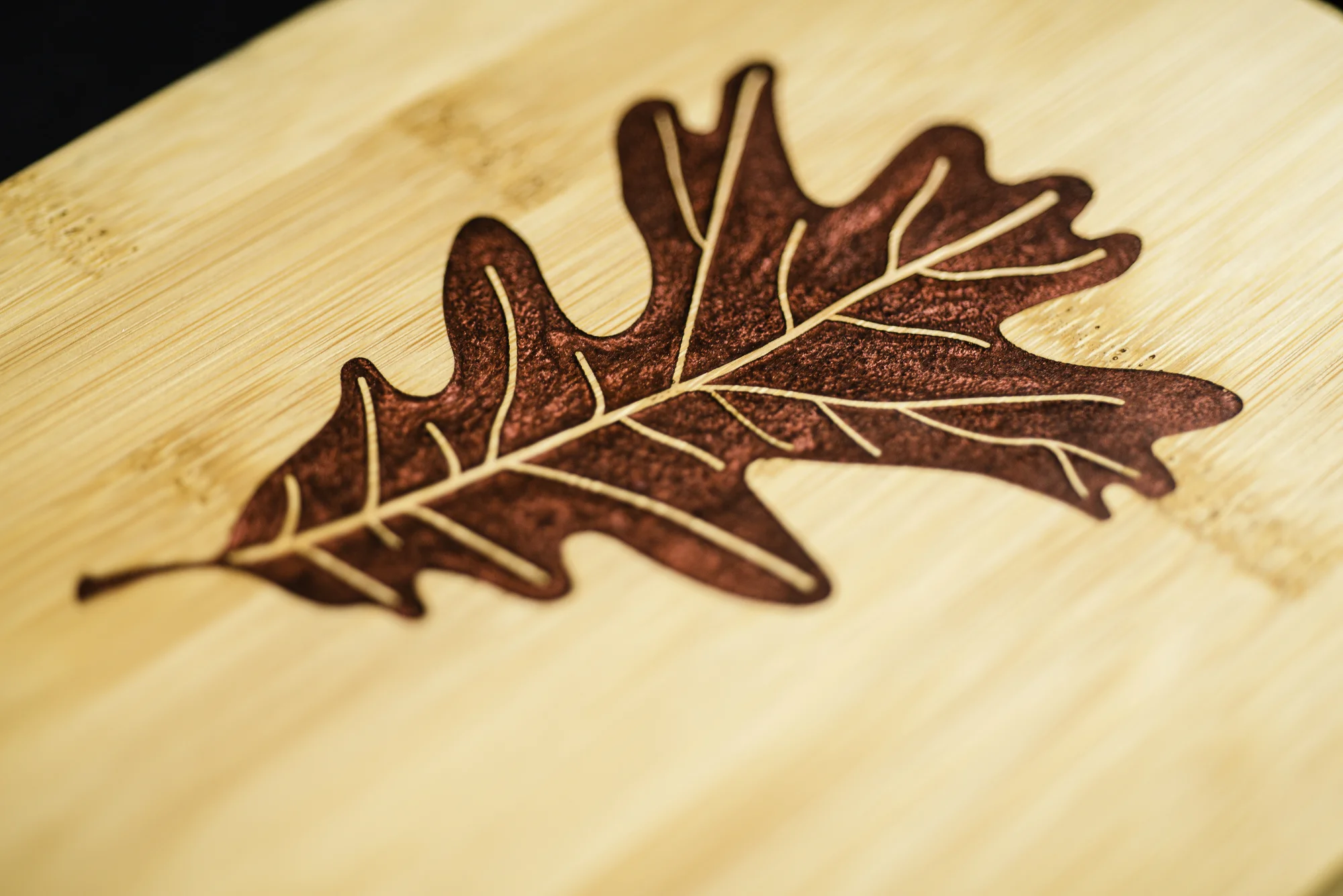 Burgundy maple leaf laser engraved charcuterie board