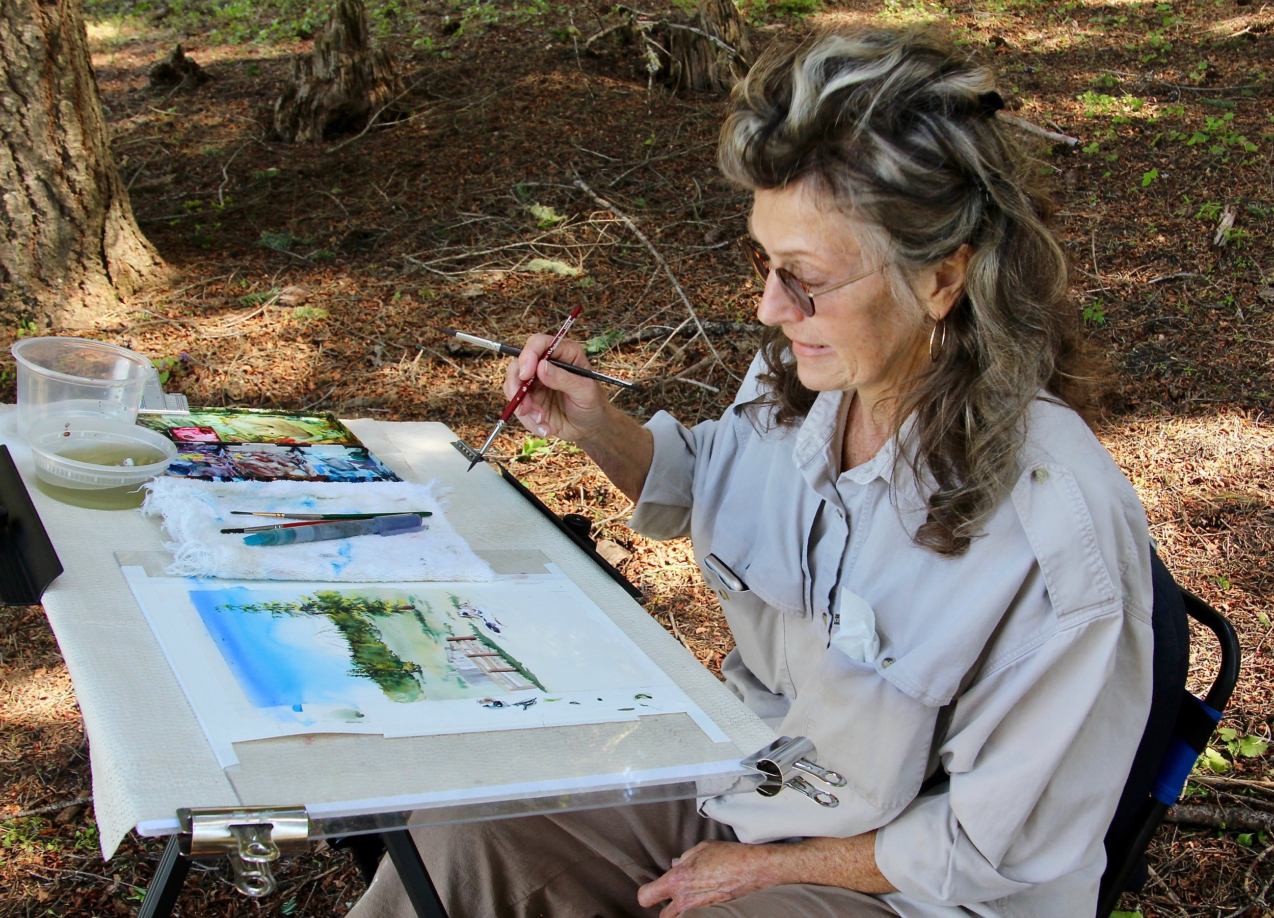 Elaine Frennett paints on-site