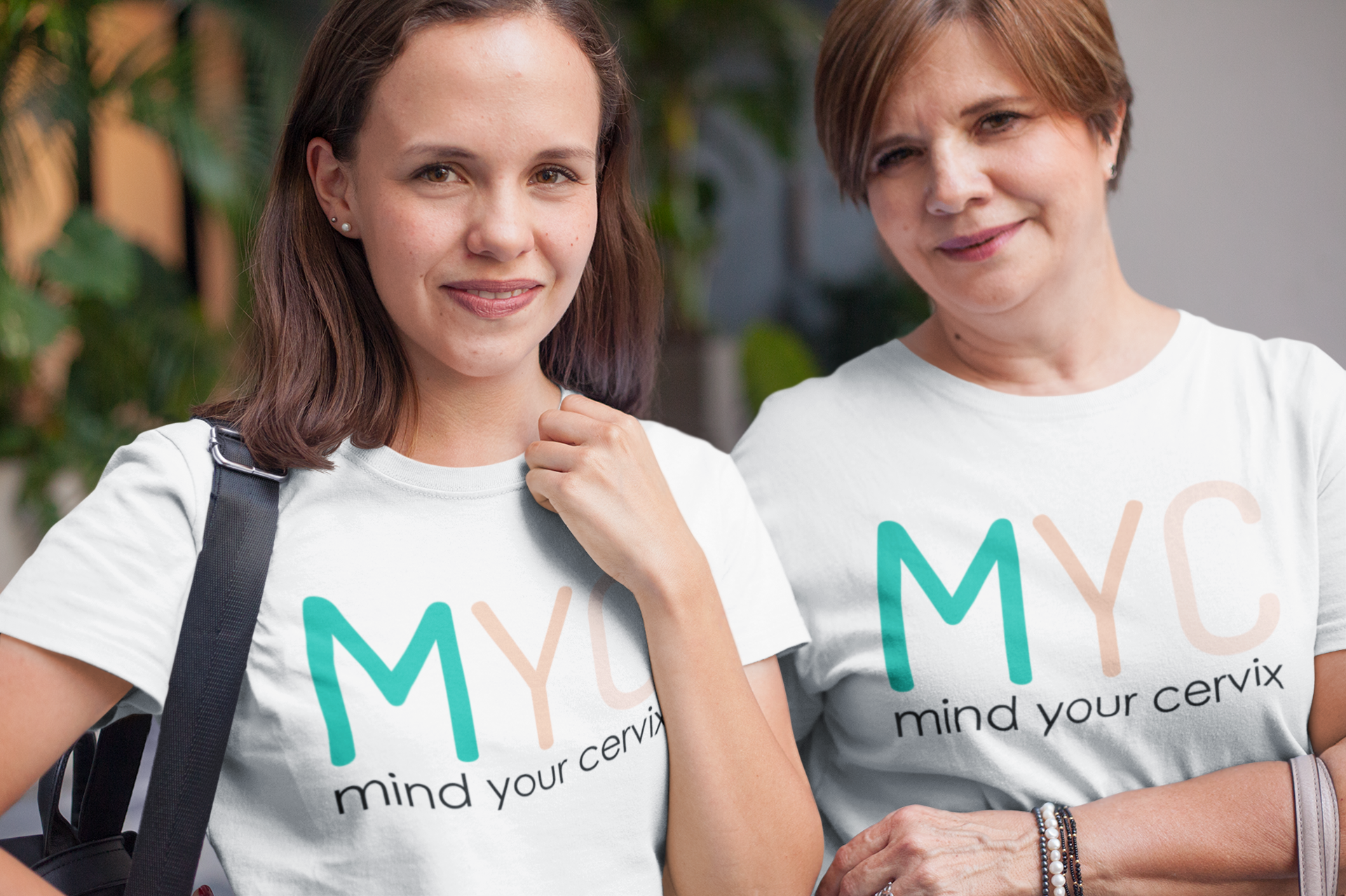 daughter-and-mom-wearing-t-shirts-mockup-taking-a-walk-downtown-a20726.png