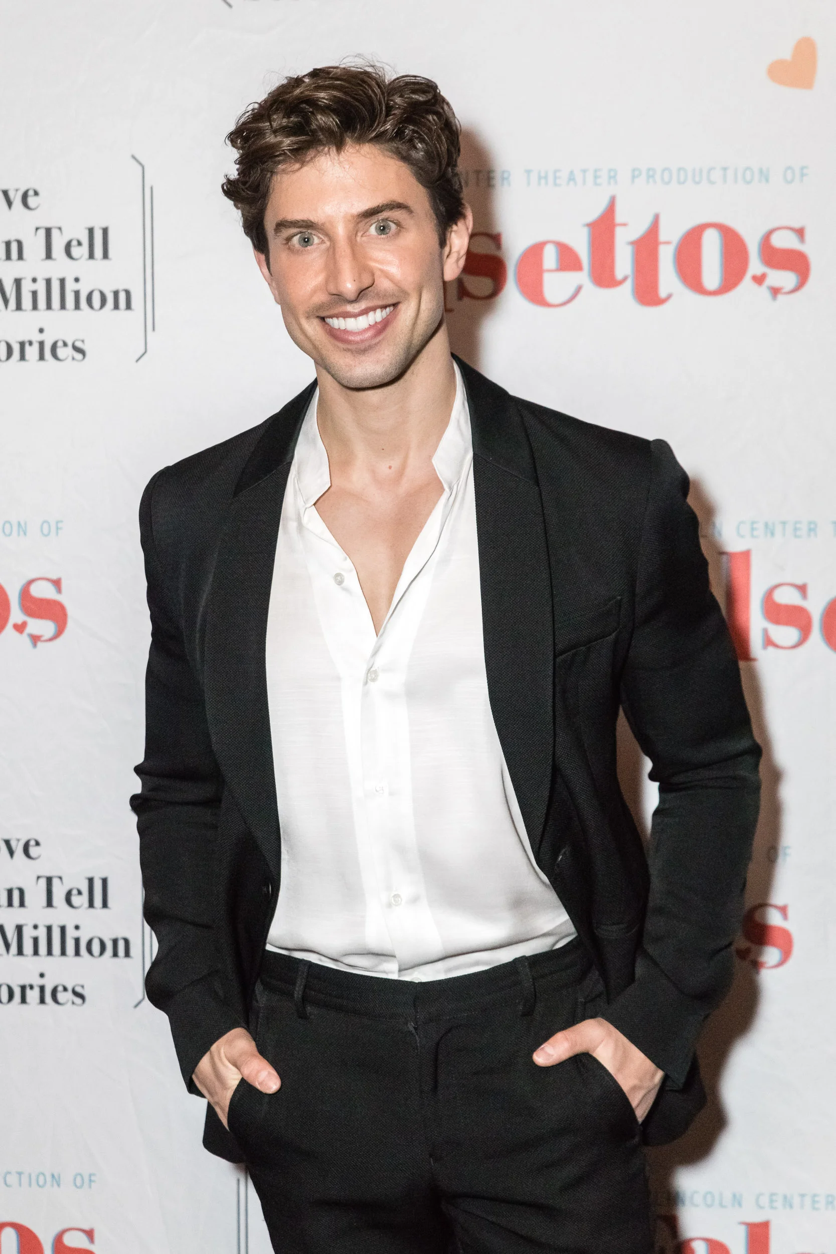 Actor Nick Adams on a step-and-repeat, by Lor Photo