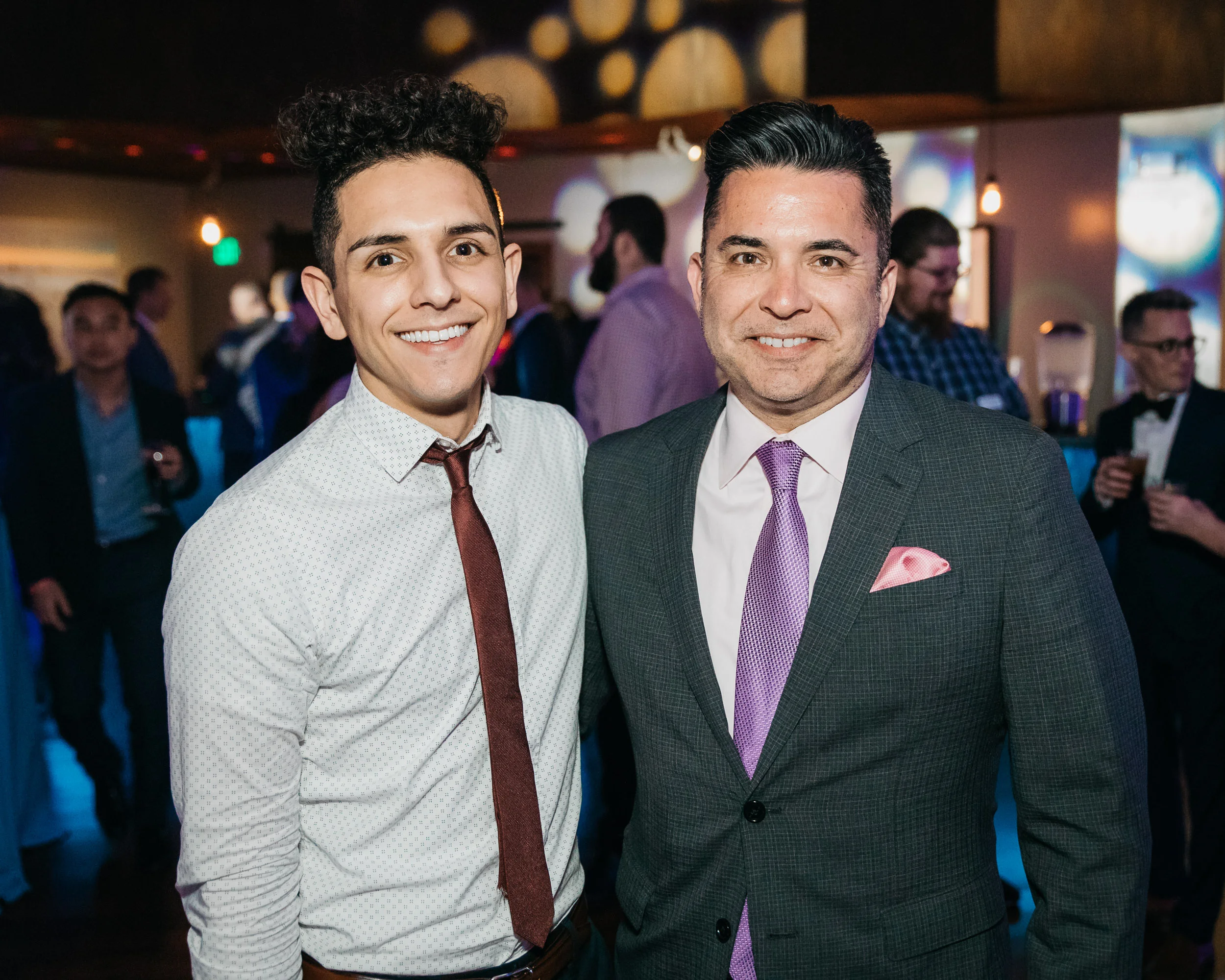 Partygoers at a fundraising event in San Francisco by Lor Photo