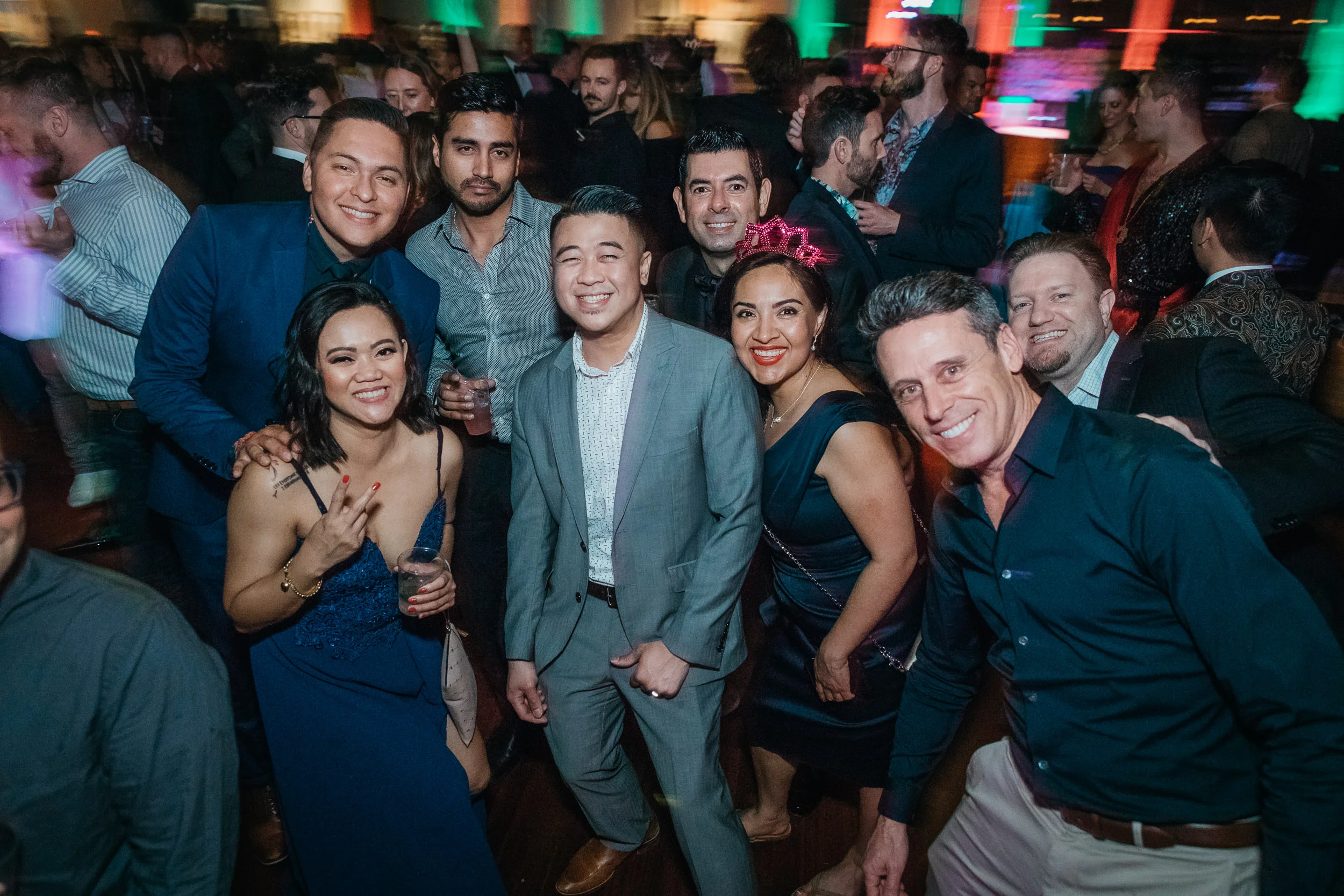 Partygoers having a blast, by Lor Photo
