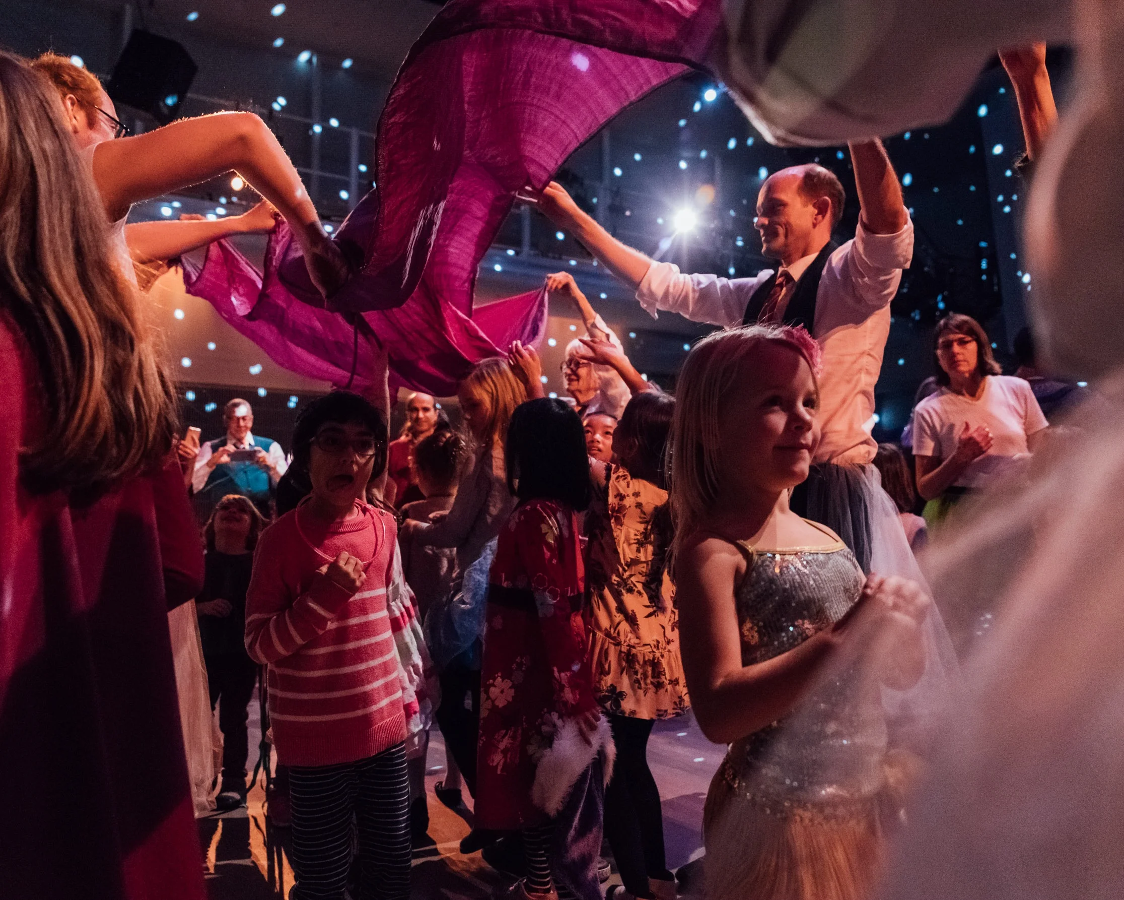 Children and adults dancing during Dance-Along Nutcracker by Lor Photo