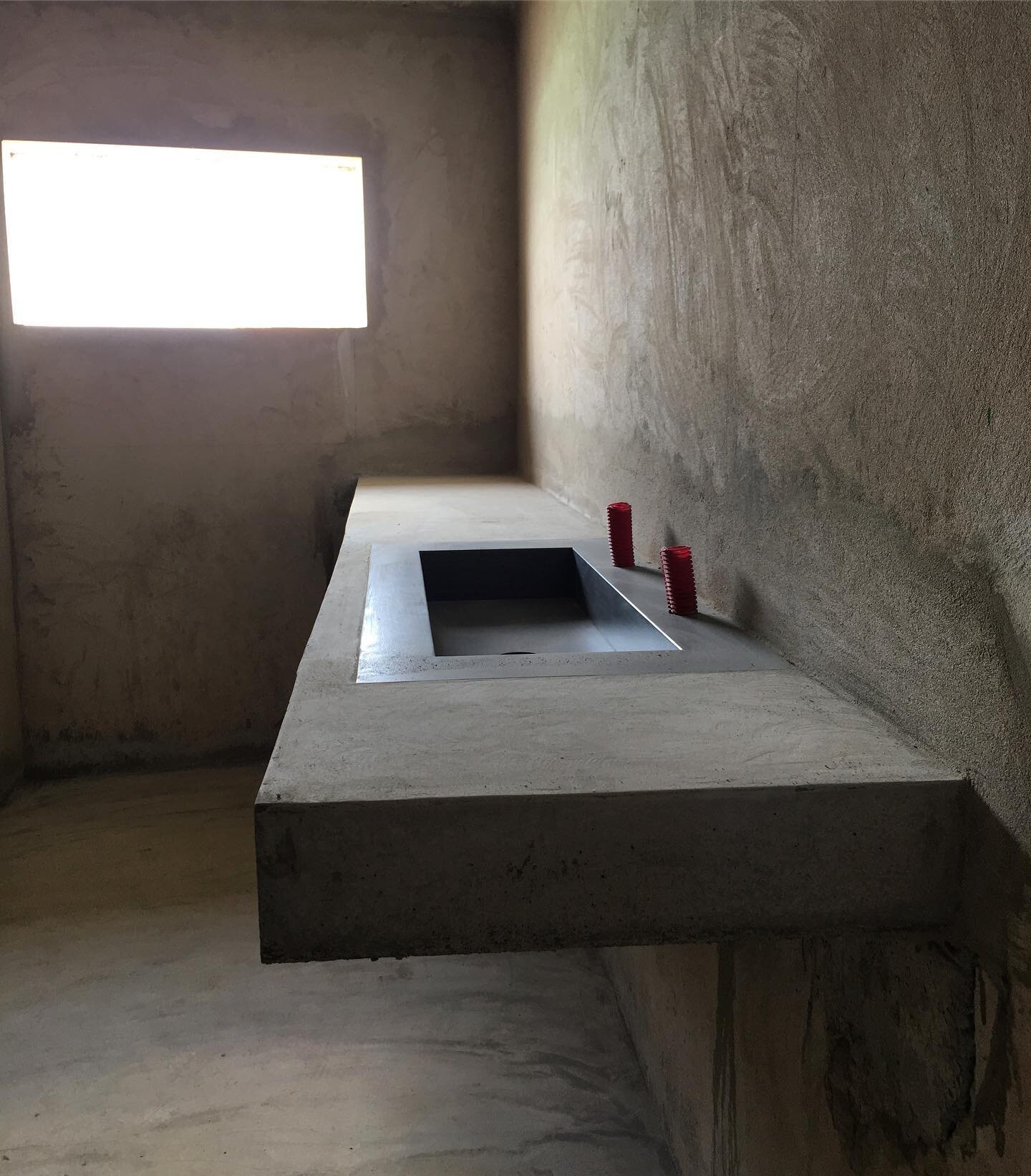 Floating concrete basins recently added to the bathrooms!