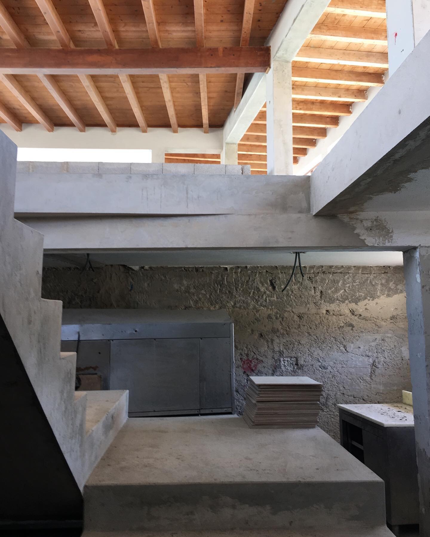 Floating concrete staircase linking ground floor (restaurant, bar &amp; terrace) to lower ground (kitchen, bathrooms &amp; staff room)