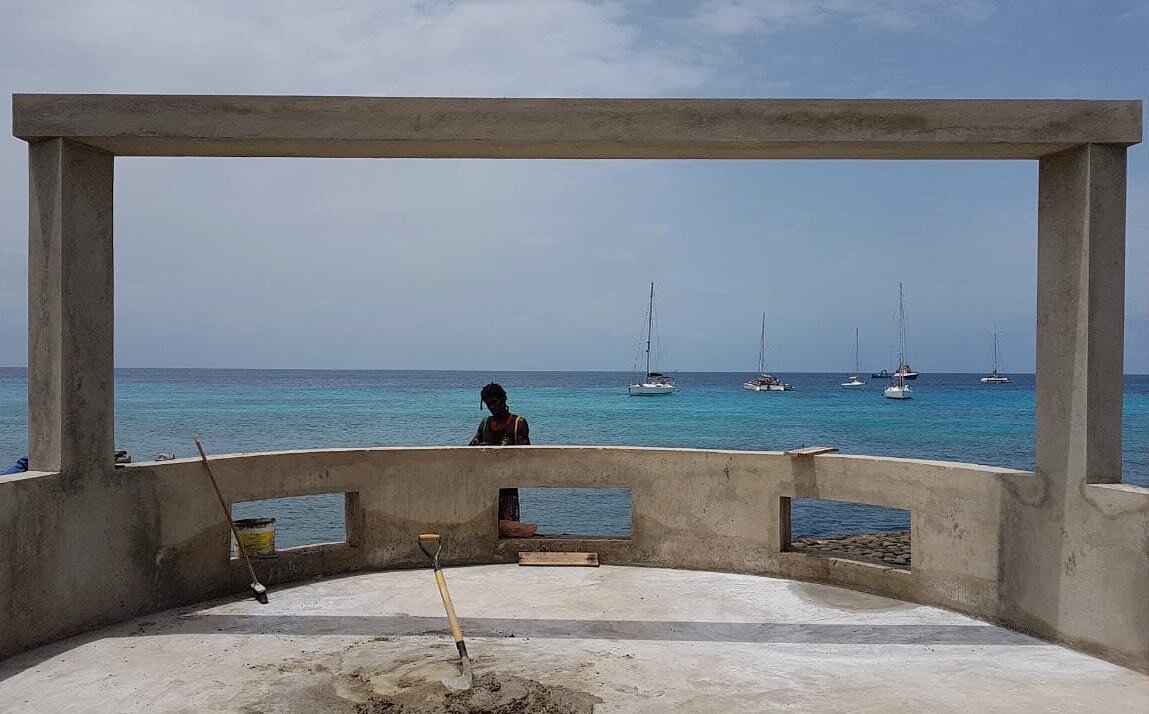 Terrace work! The concrete beam framing the turquoise sea...