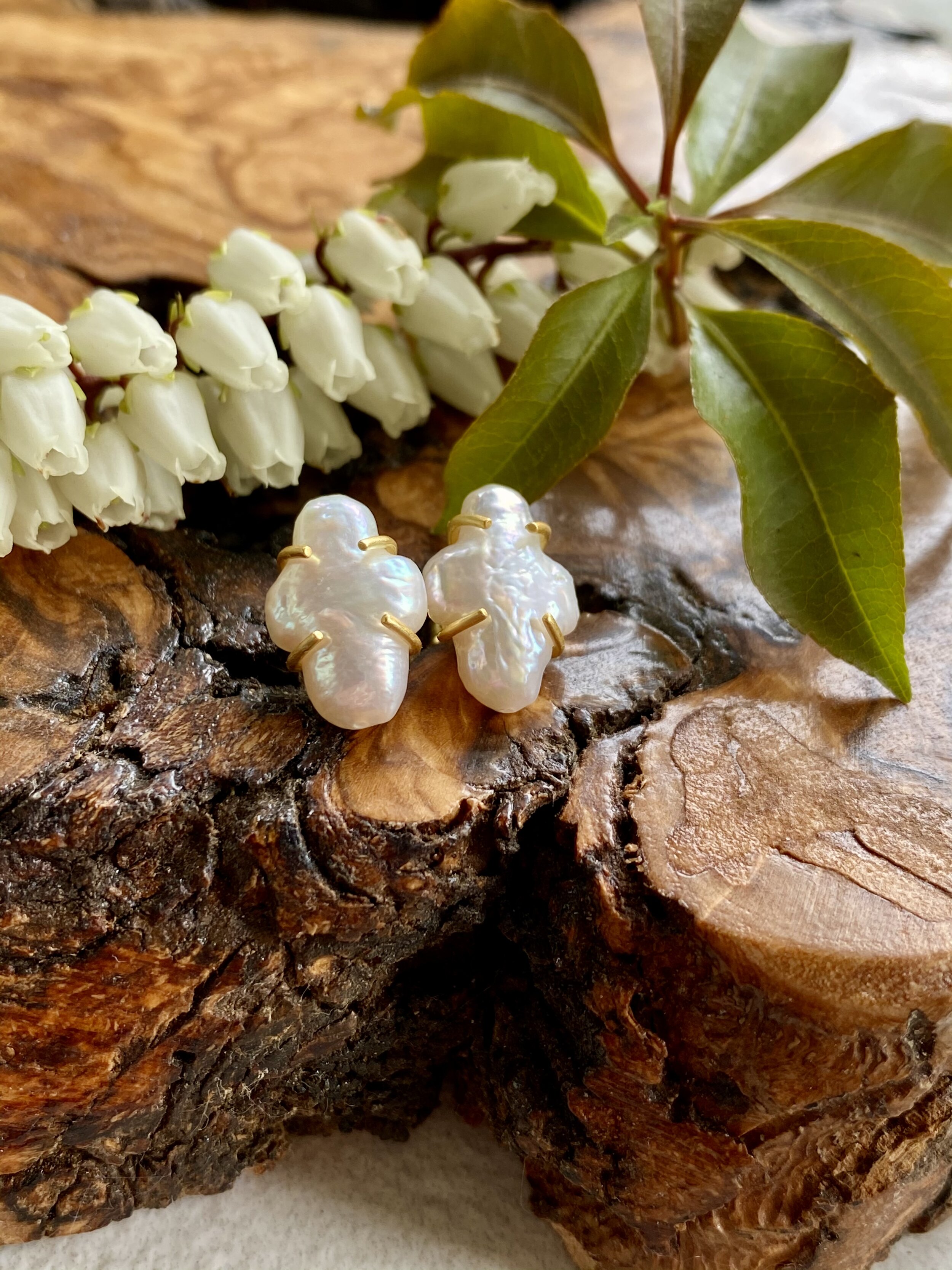 Pearl Crosses on Gold Huggie Post.
