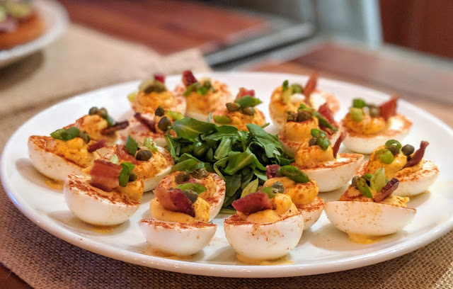 Deviled Eggs, with bacon, green onions and capers