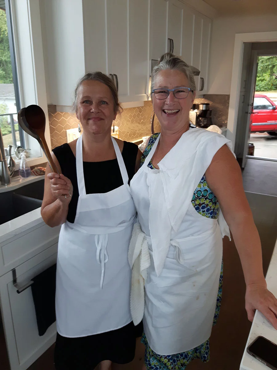 Michelle Plain (right) with kitchen & catering helper Leslie (left).