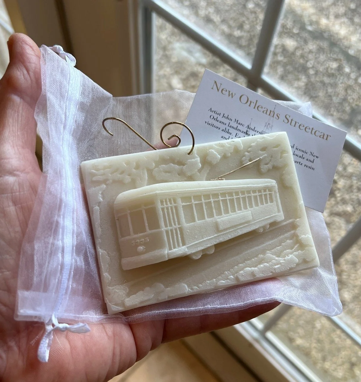 New Orleans streetcar memento created form the original large scale relief work, example of an urban icon used for brand recognition and fundraising.