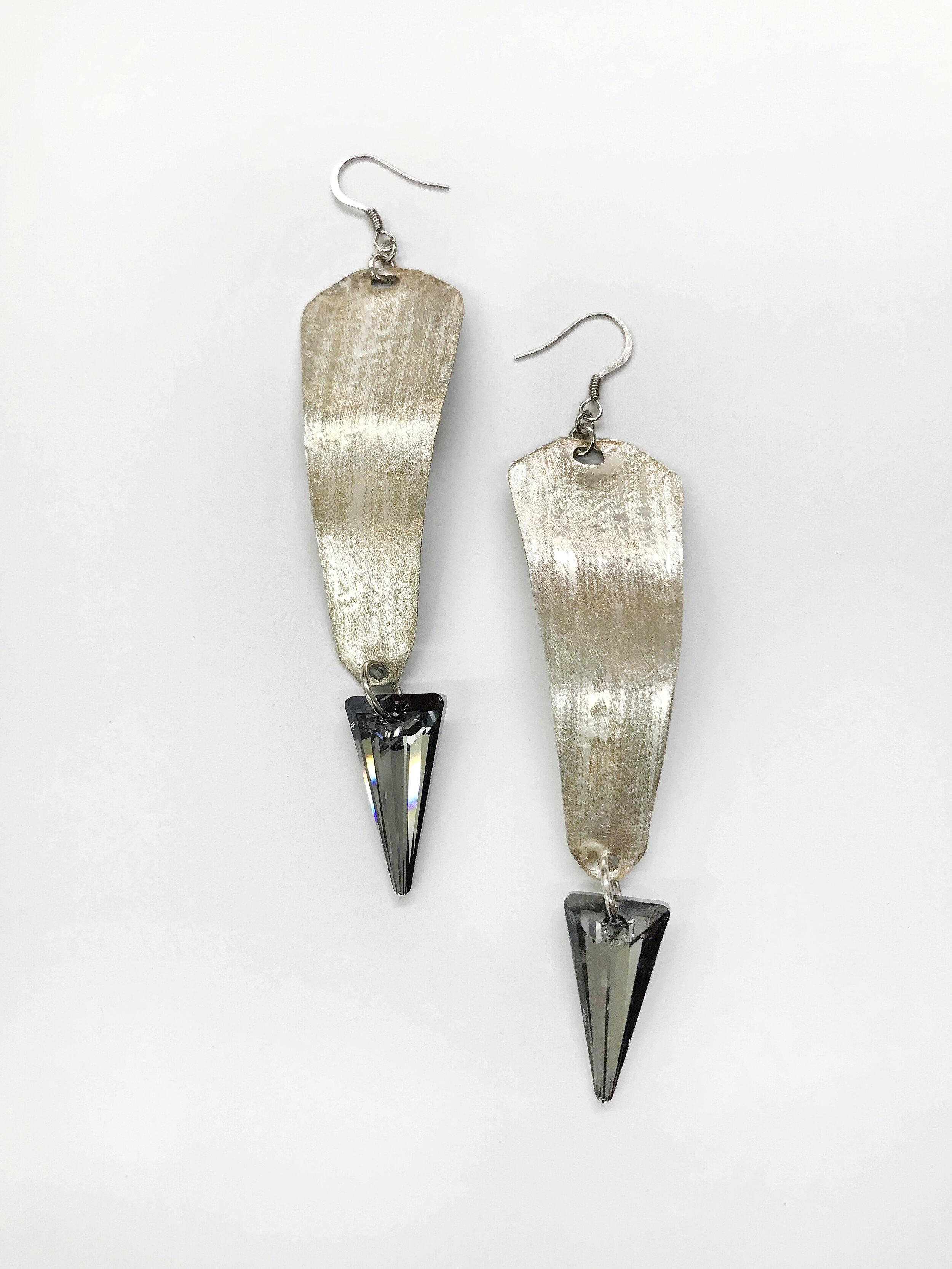 Swarovski Hammered Metal Spike Earrings $165