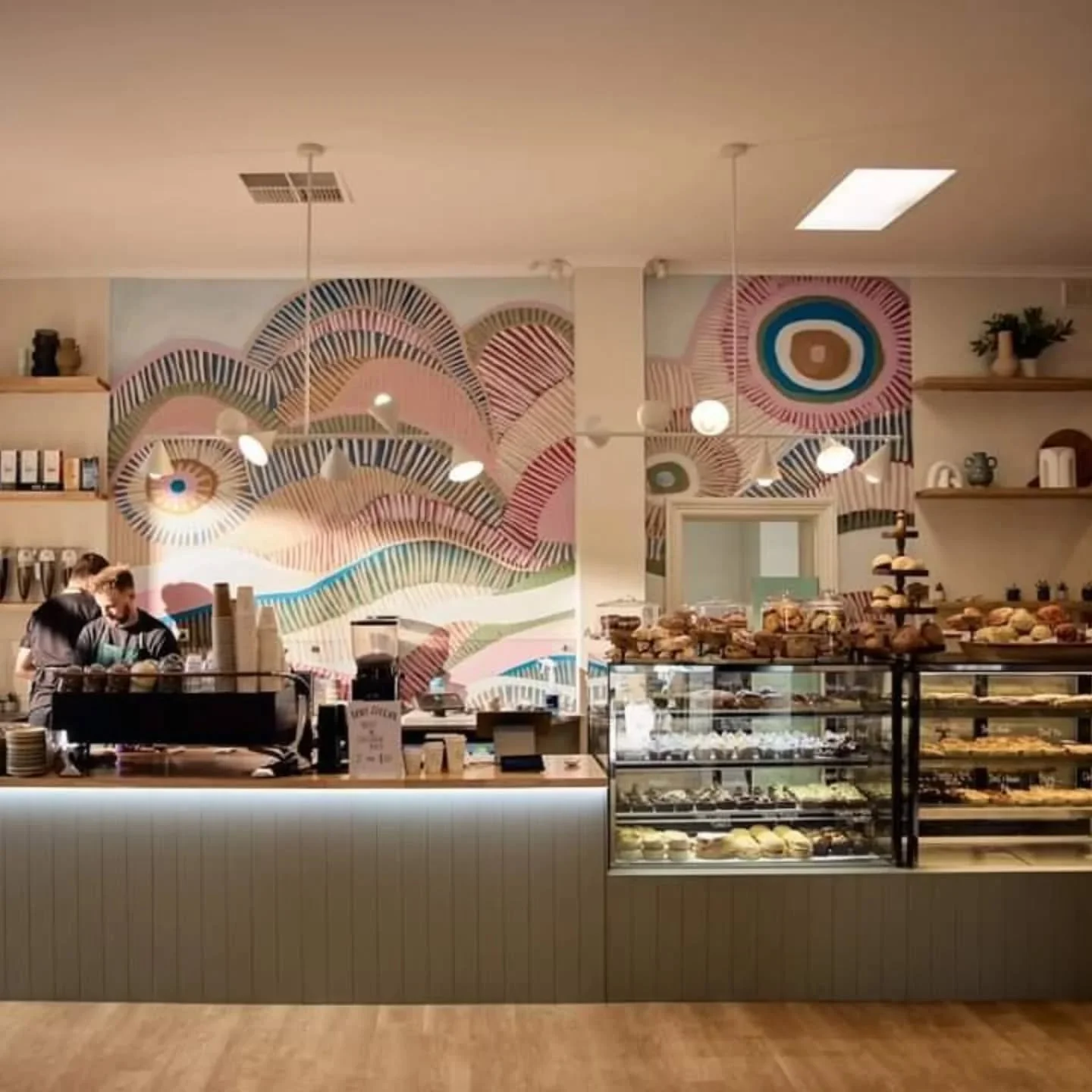 Wallpaper for the win... ⁠
In this vibrant commercial space I used feature wall paper as a focal point. ⁠
⁠
The strongly patterned wall paper at the back of the shop front draws the eye and the feet into the space! ⁠
⁠
These colours are used througho