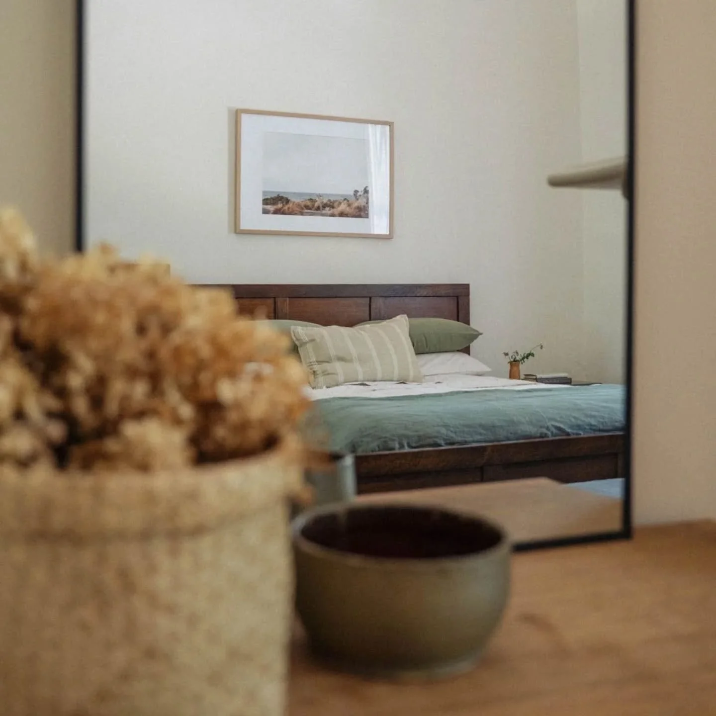 The styling was kept pared back for this master bedroom. ⁠
⁠
It has beautiful architectural features like an original fireplace and high ceilings, and they deserve to the the highlight in this room.⁠
⁠
Keeping the colour palette of greens, taupes, wa