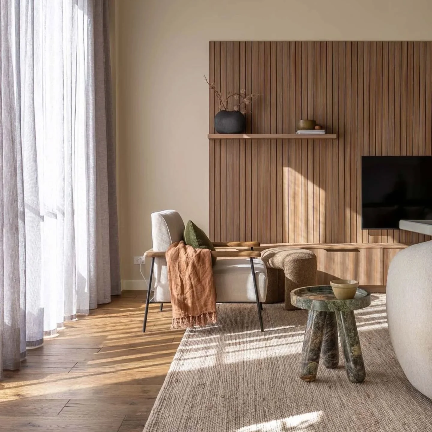 Stunning natural light makes all the difference for this open plan living space. ⁠
⁠
For this project my clients wanted a warm modern organic style for their home.⁠
⁠
The choice of furniture, rugs, window furnishings and custom joinery all work toget