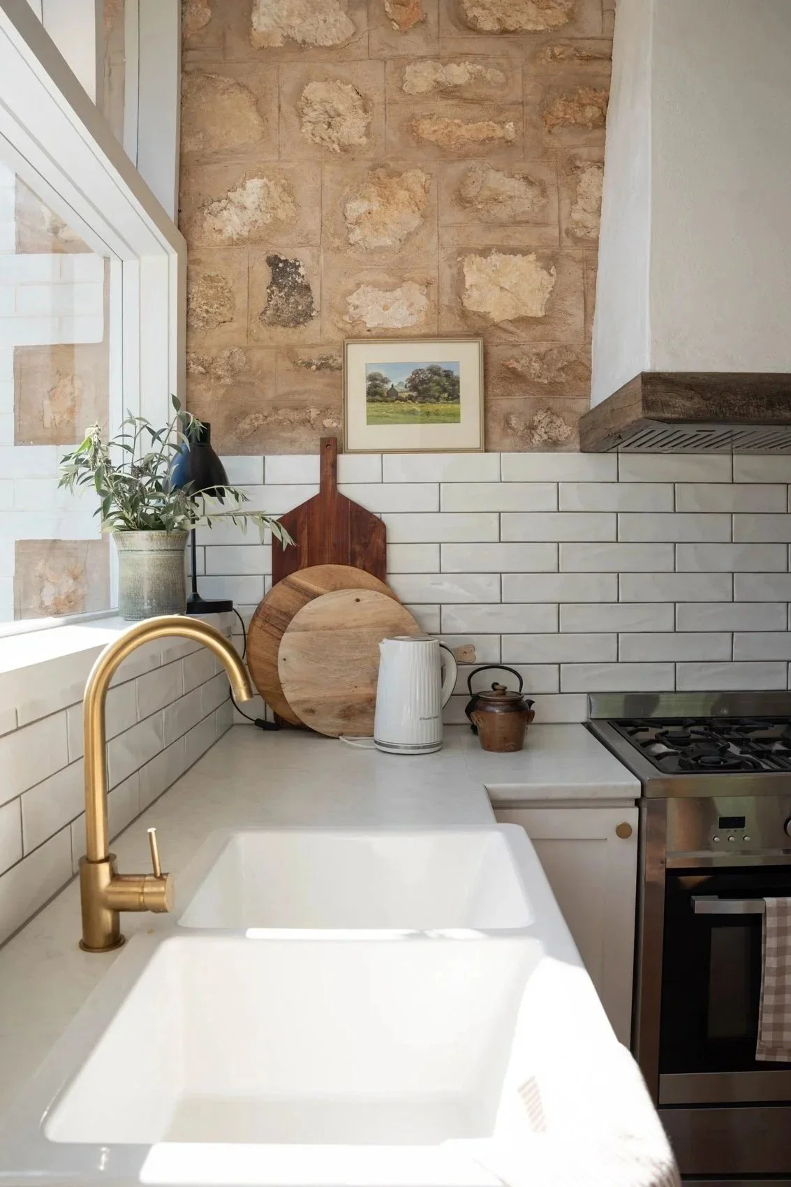 Farmhouse ceramic sink with brass tapware
