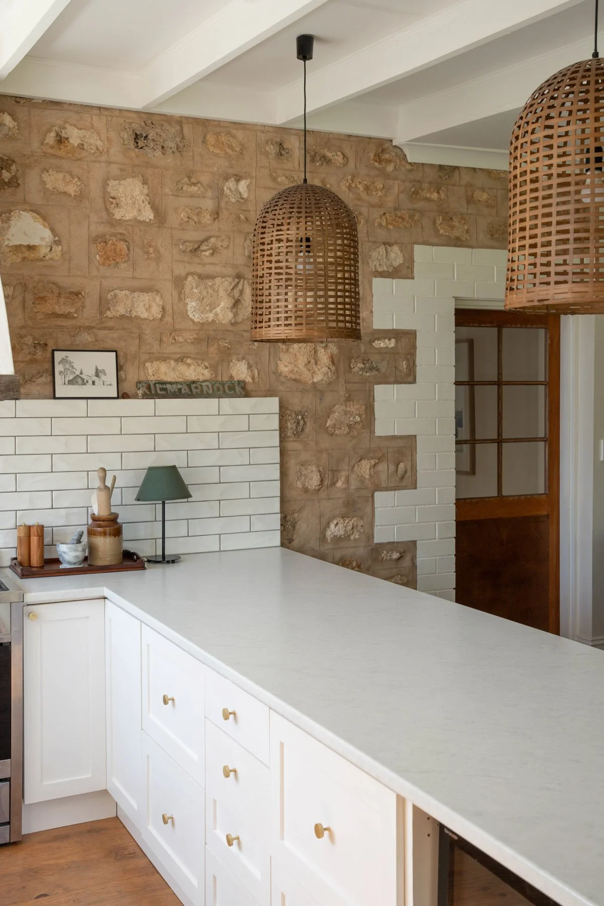 Country kitchen with stone wall