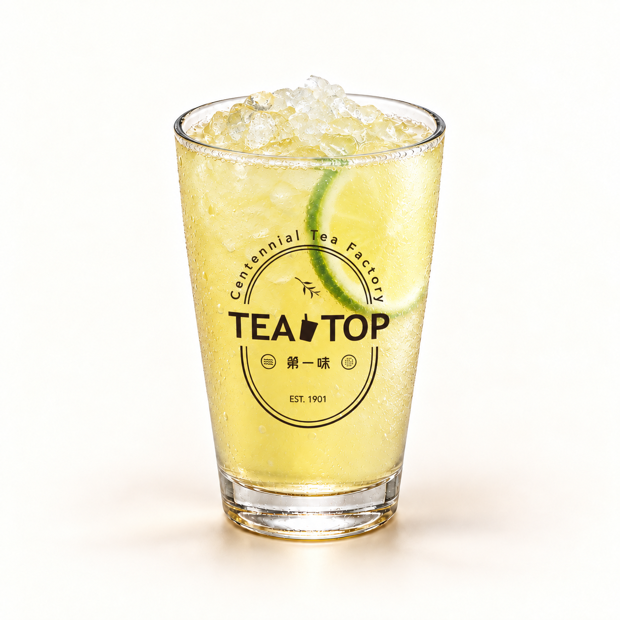 Lemon Green Tea in a TEA TOP branded glass — AI-retouched presentation.