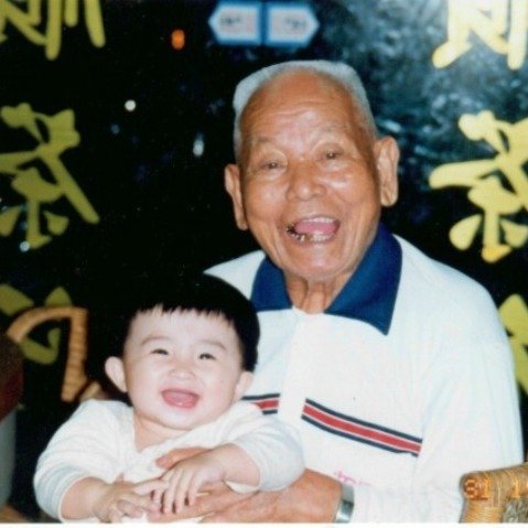 Grandfather and child in a family photograph from TEA TOP Taiwan’s official origins page.
