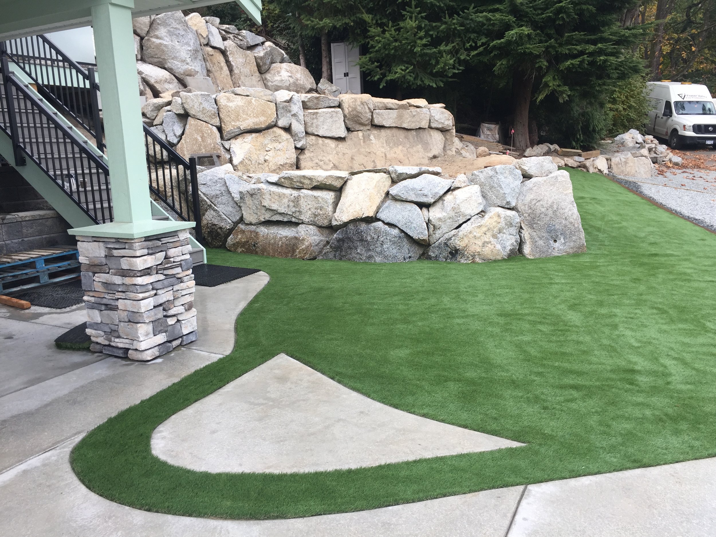 syn grass against rock wall2.jpeg