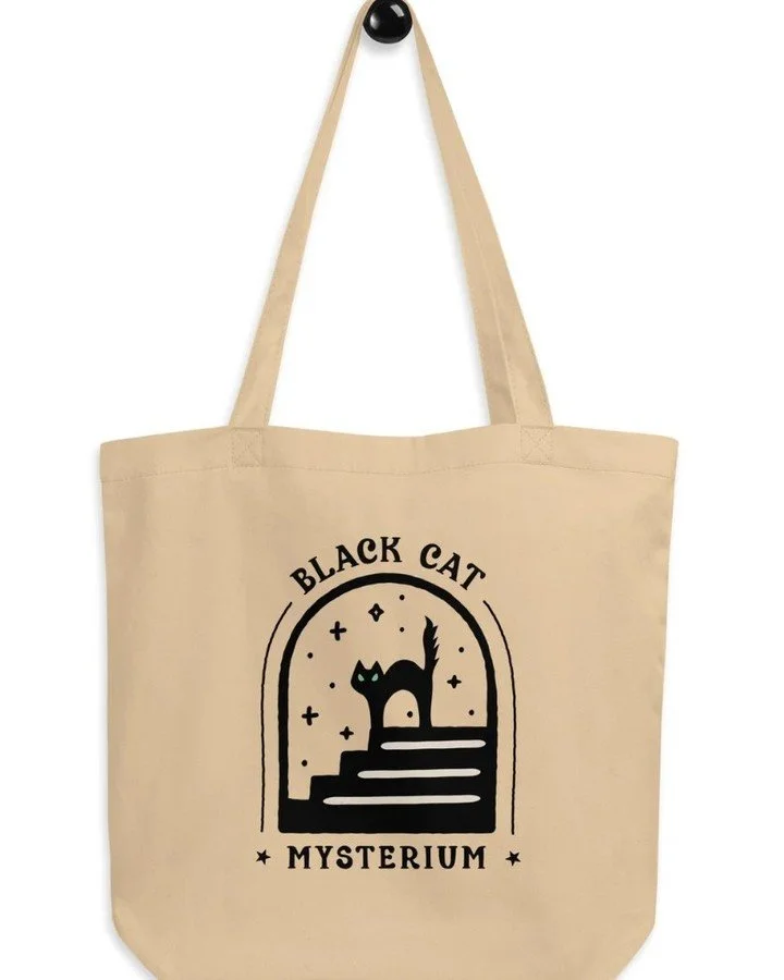 Shopping season has begun... and the spirits say bring a tote.✨ 

Our Black Cat Mysterium bag is your new go-to for spooky market runs, witchy bookstore hauls, or gift gathering under the full moon. 🛍️🐈&zwj;⬛♻️

Eco-friendly. Mysteriously stylish. 