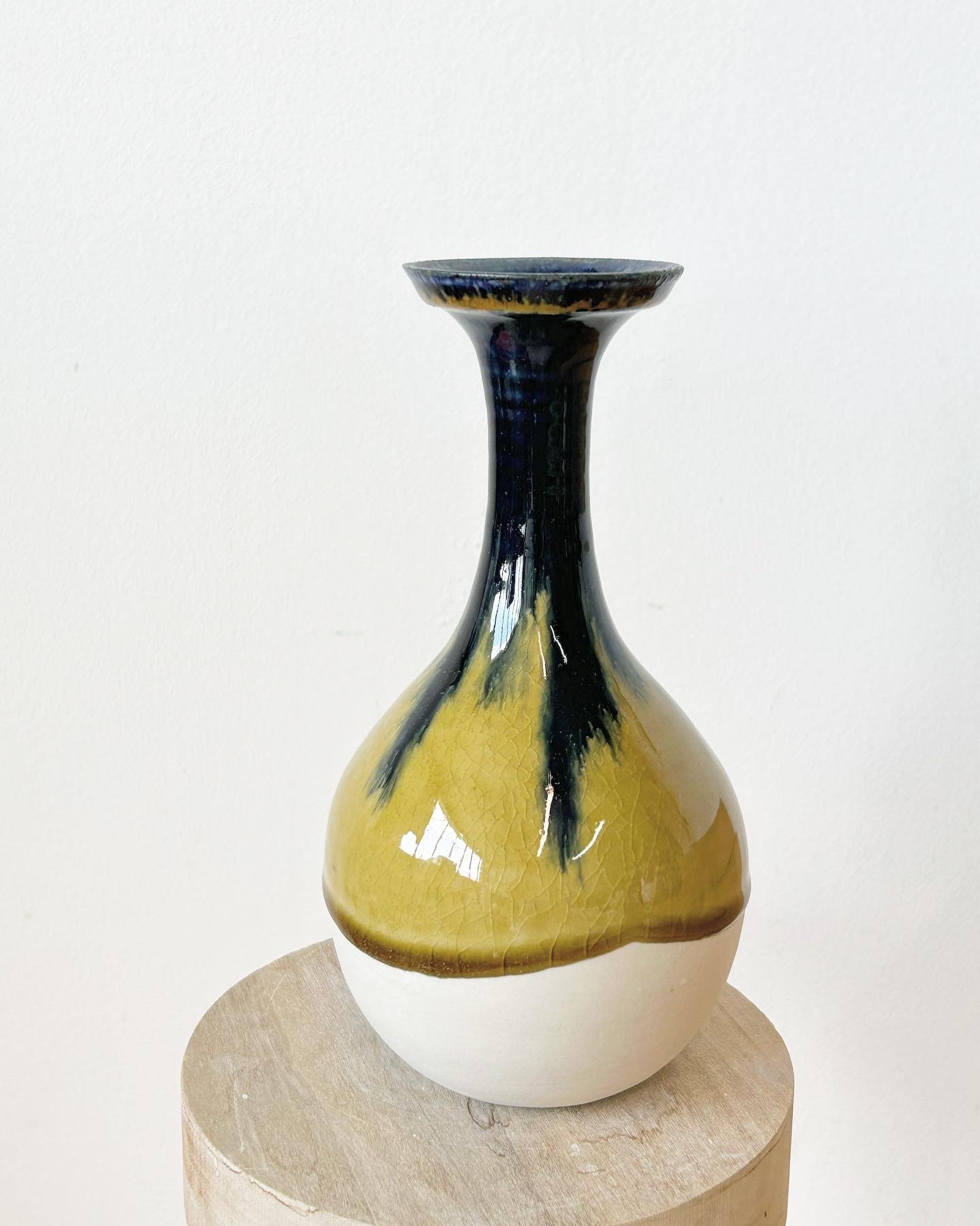 Ash glazed vase with bleeding cobalt 