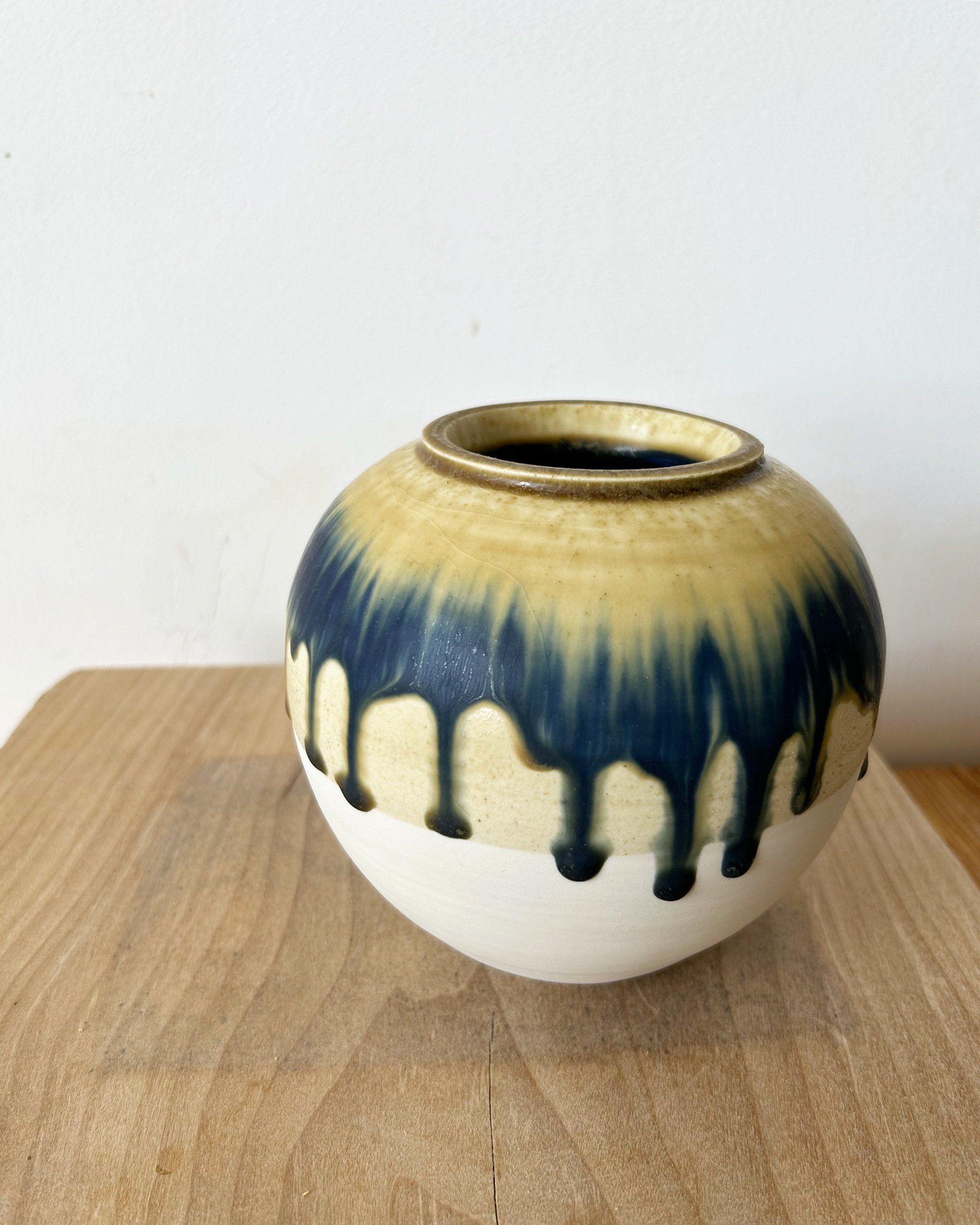 Ash glazed vase with running cobalt