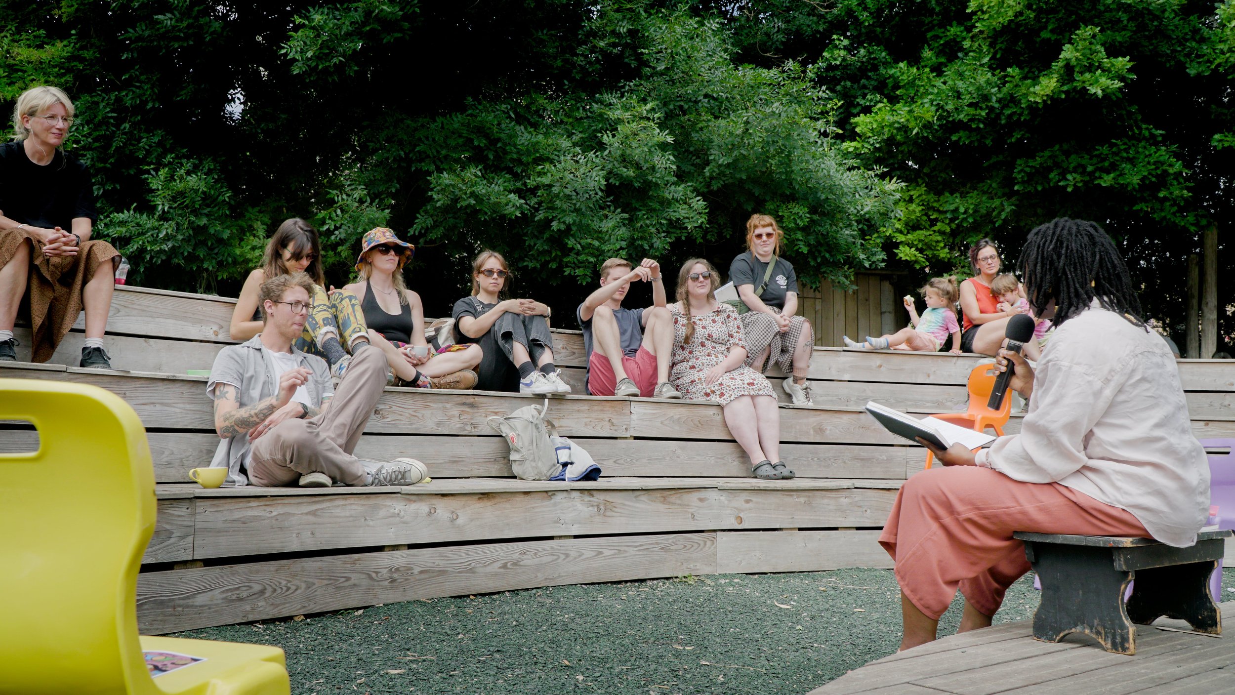 Leeza Awojobi poetry reading at Windmill City Farm, June 2025. Photo © Oliver Thistlewood, Crockshock Productions