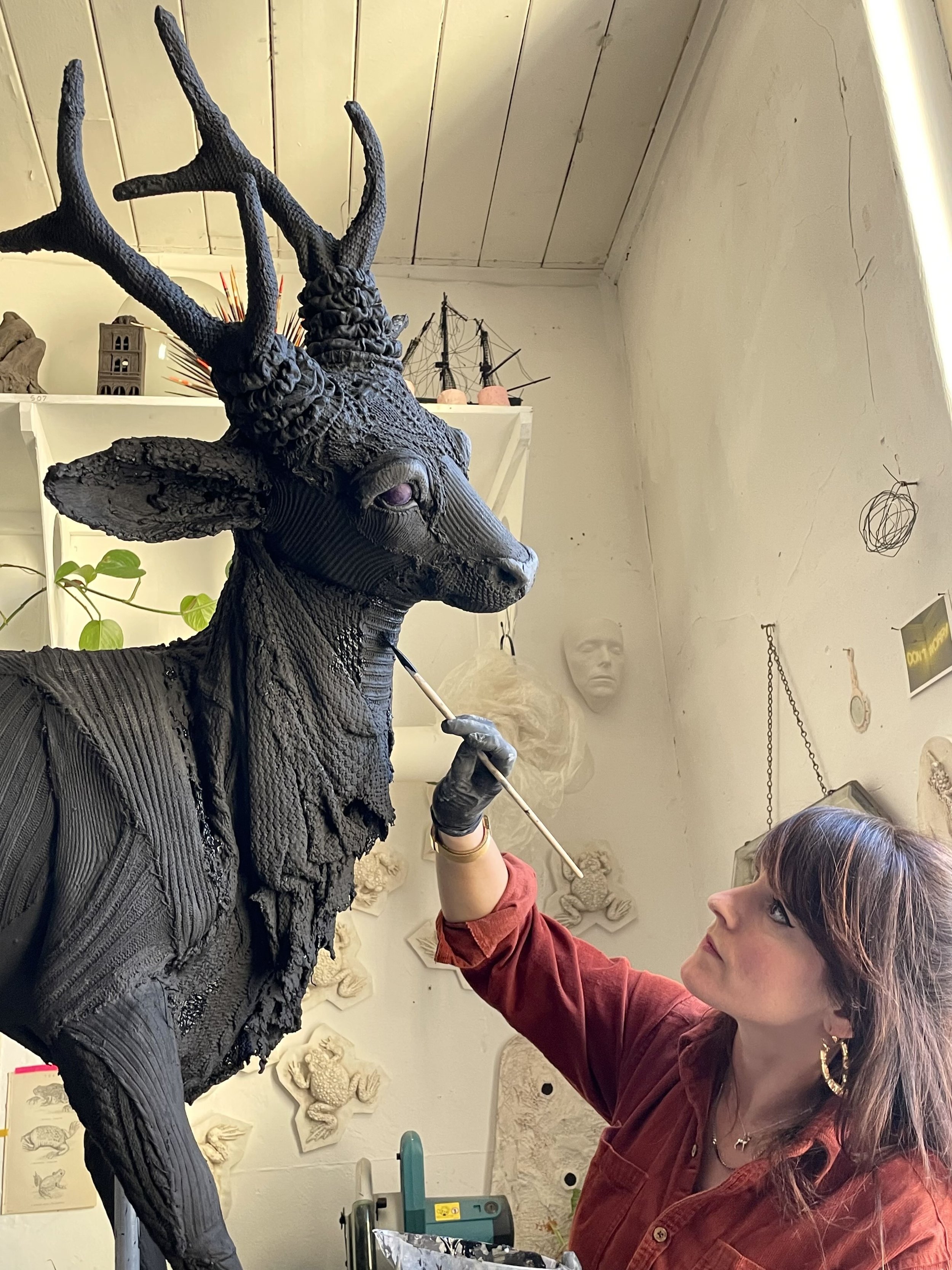 Dorcas working in her studio creating the deer sculpture, courtesy the artist
