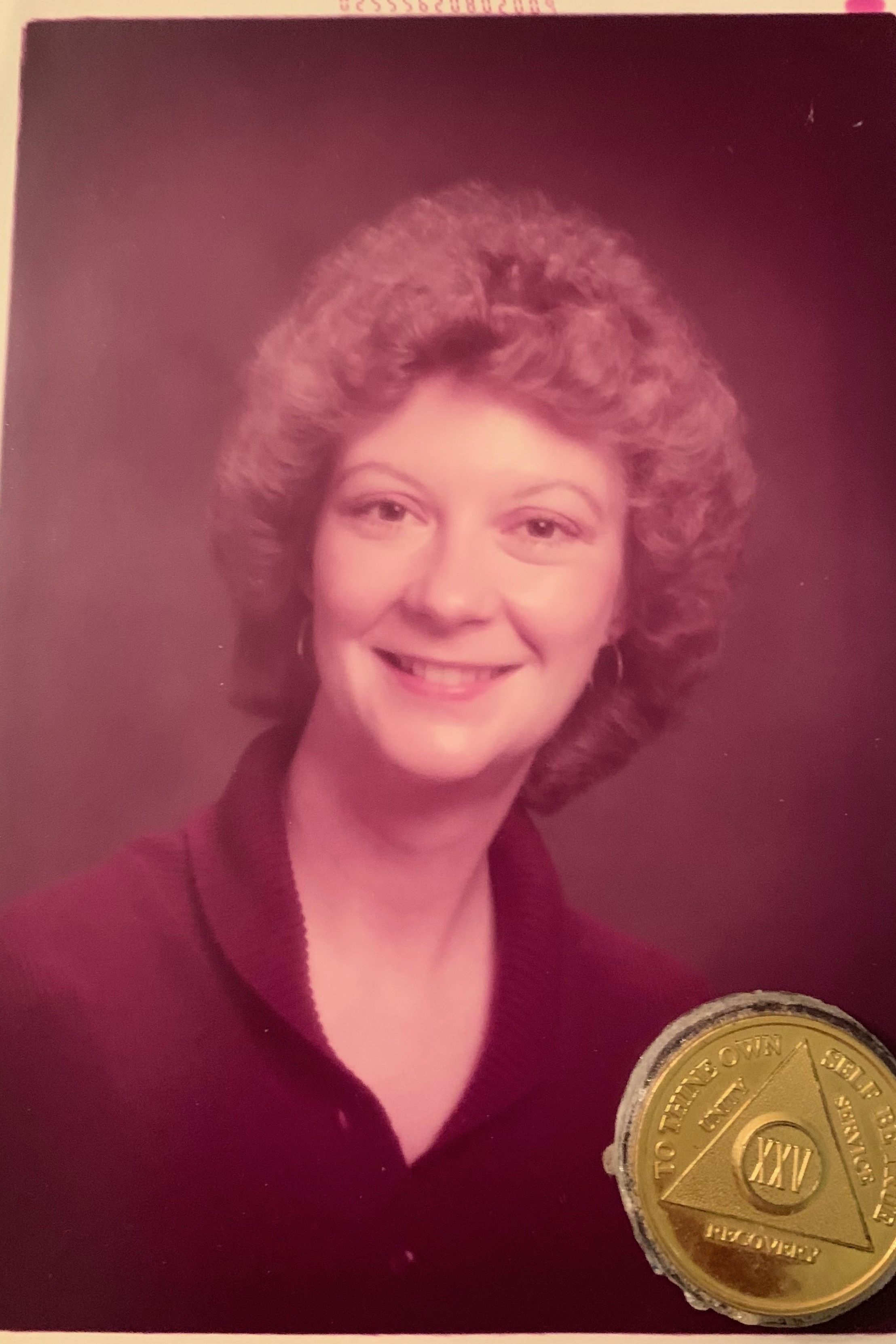 Jo White-Linnemon and her 25 Year Sobriety Chip.