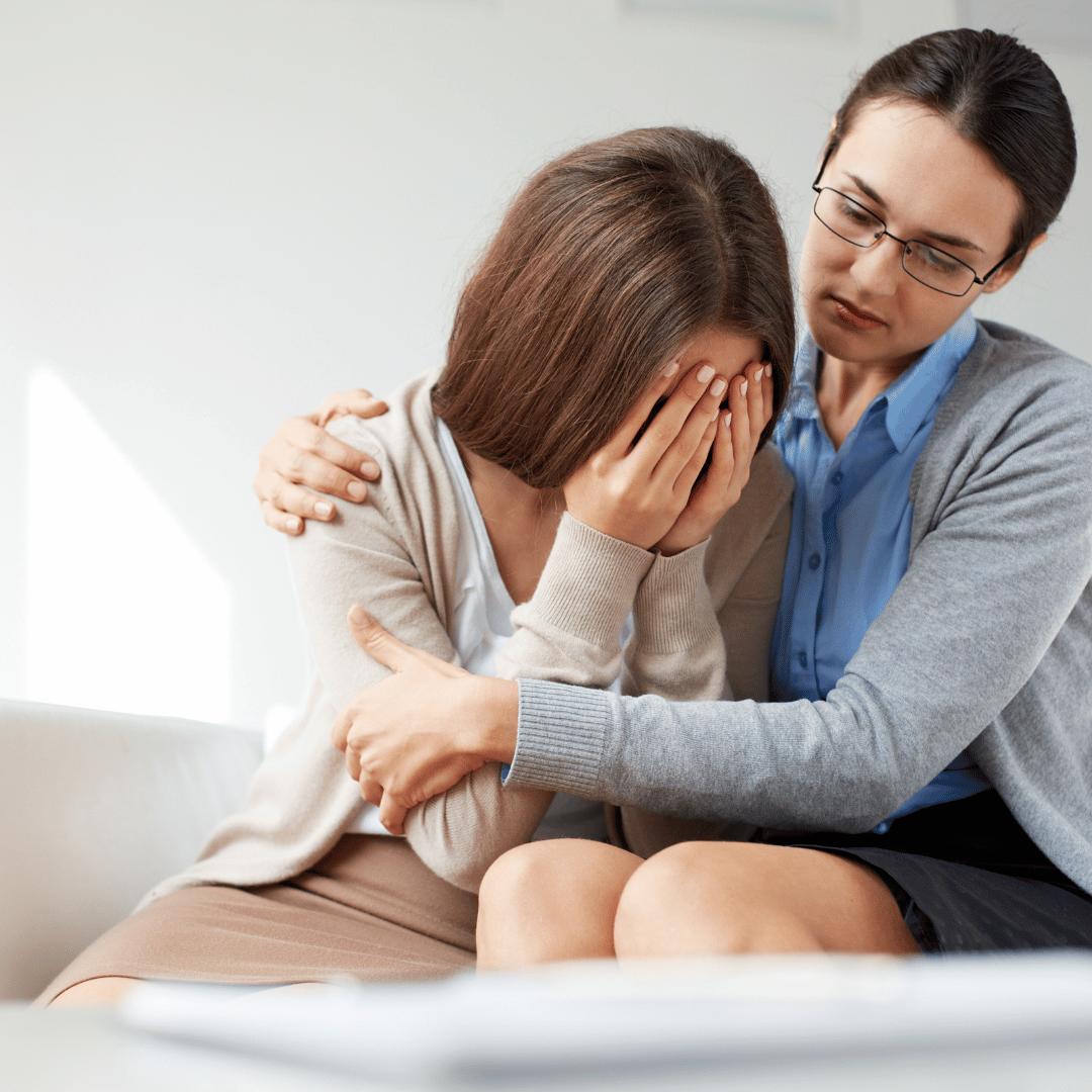 Girl crying in therapists arms | grief counseling in birmingham, al | grief counselor in birmingham, al | grief counseling in alabama | 35208 | 35209 | 35210