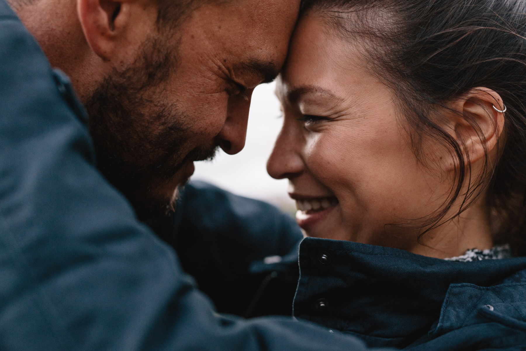 Photo of couple touching foreheads together. Wondering how to navigate your relationship in the new year? Learn how marriage counseling in Birmingham, AL can help get the support you need.