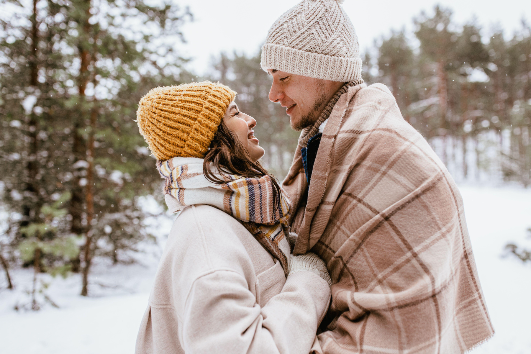 Photo of a couple outside in the snow. Learn how to start the new year with a gentle reset for your relationship with Sparrow Counseling’s support in Birmingham, AL