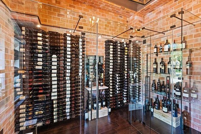 Who would love to have a wine room like this? Custom faux brick walls and ceiling with a &ldquo;Chicago Brick&rdquo; finish.  #mwplastering #custom #plaster #wineroom #luxury