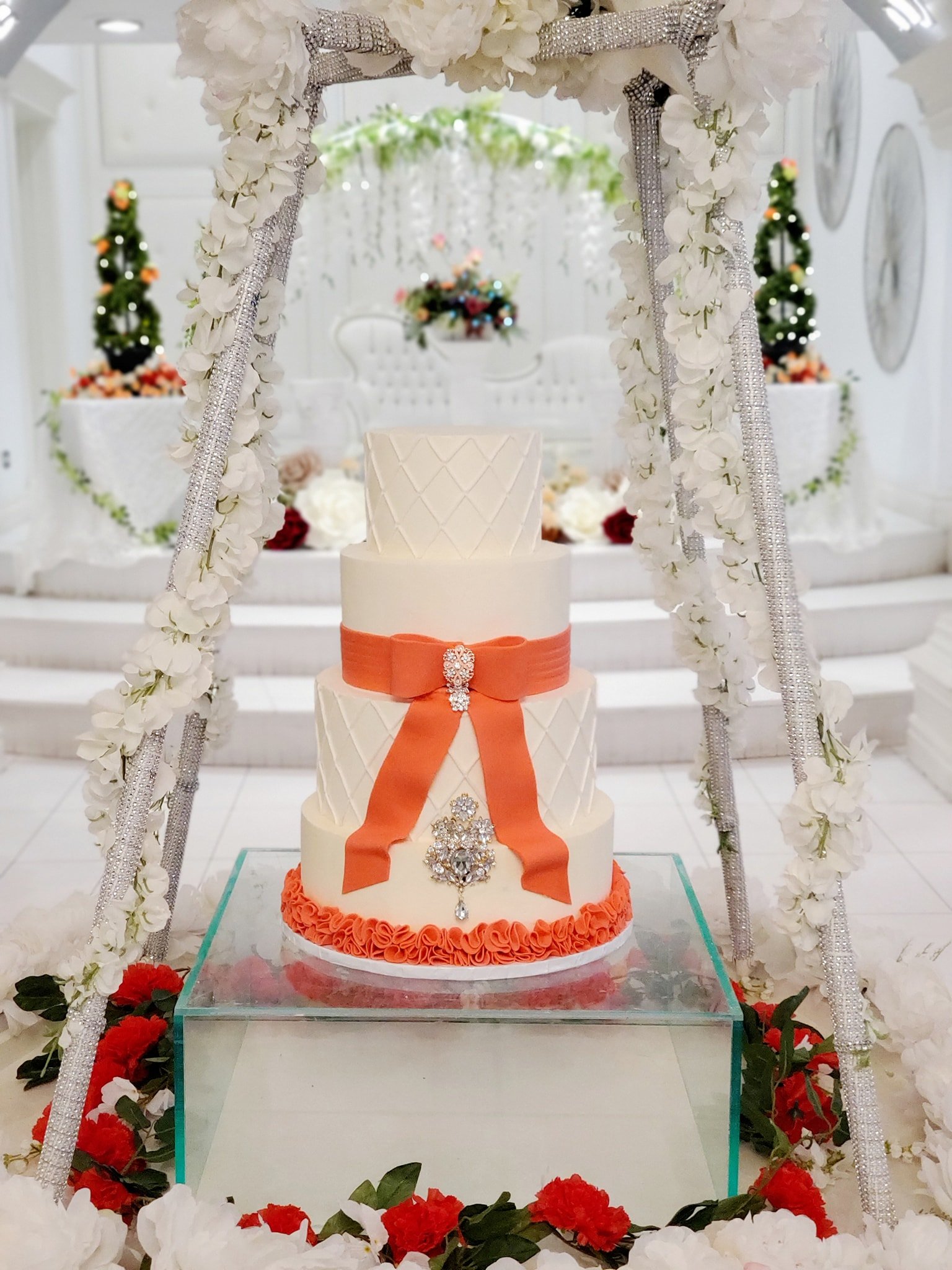 floating cake, coral ribbon blinged out.jpg