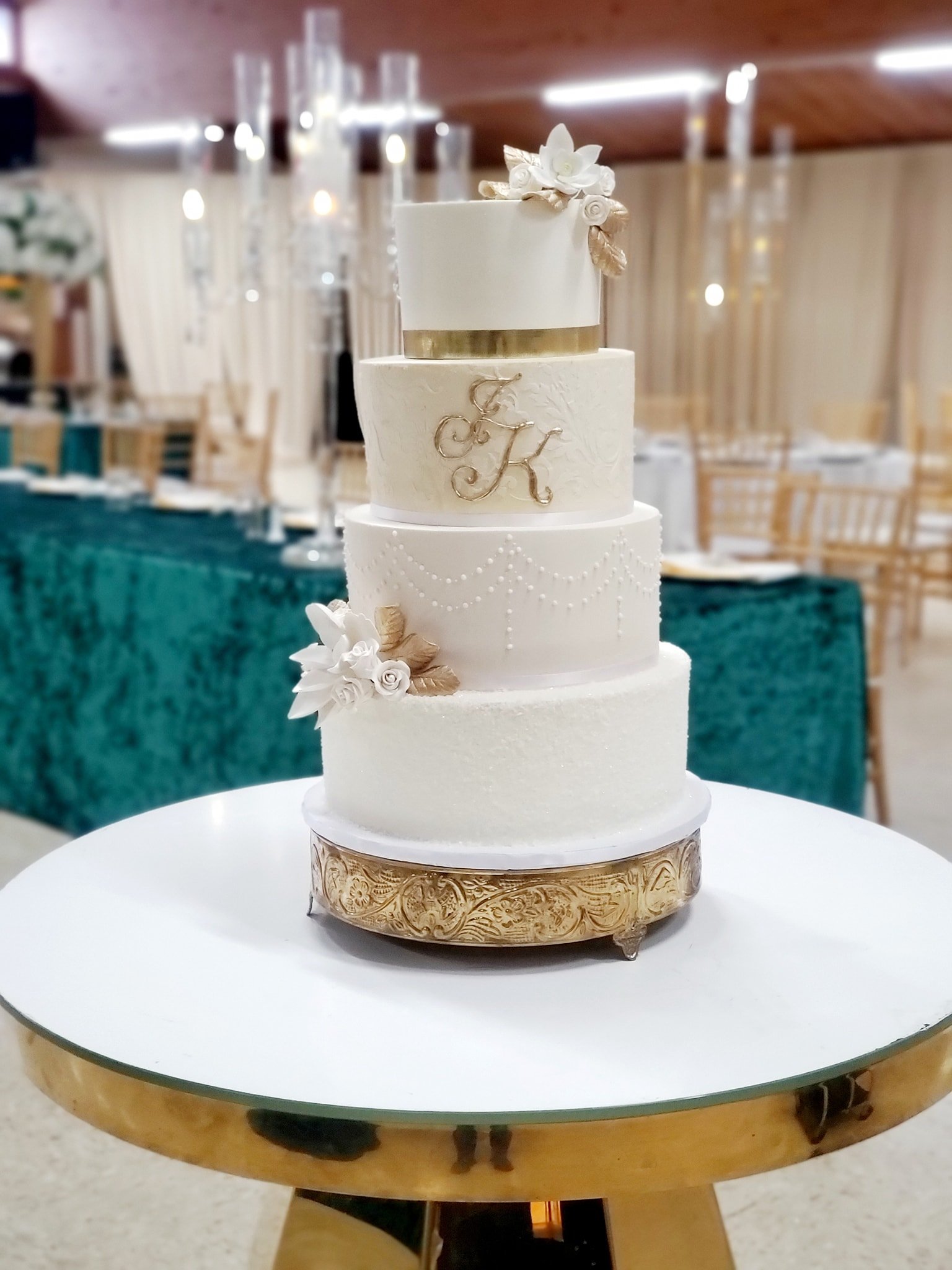 gold and white wedding cake.jpg