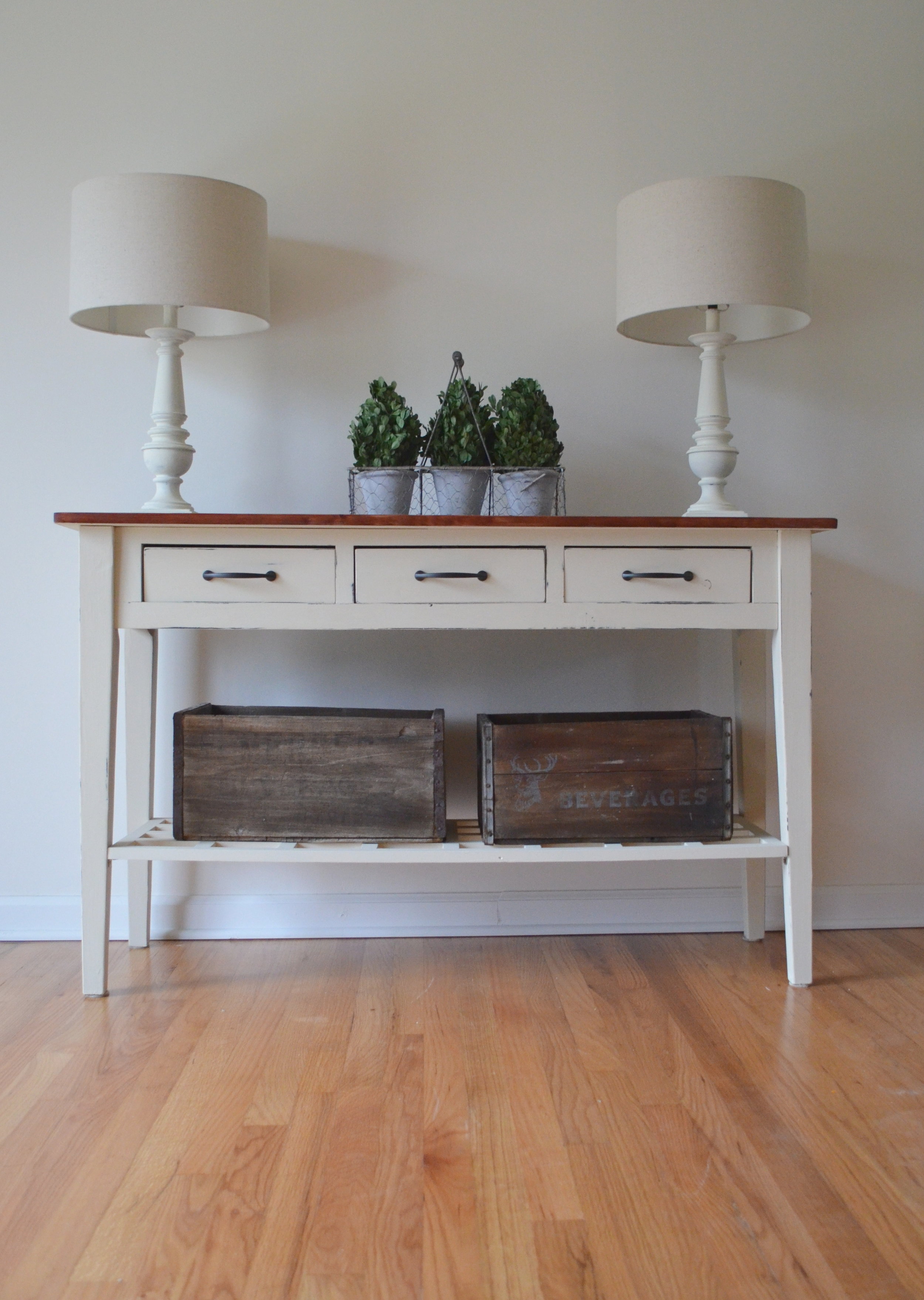 a sofa table goes from contemporary to classic