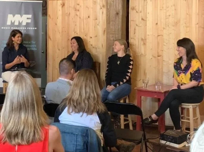 The Manager Panel sharing a laugh.