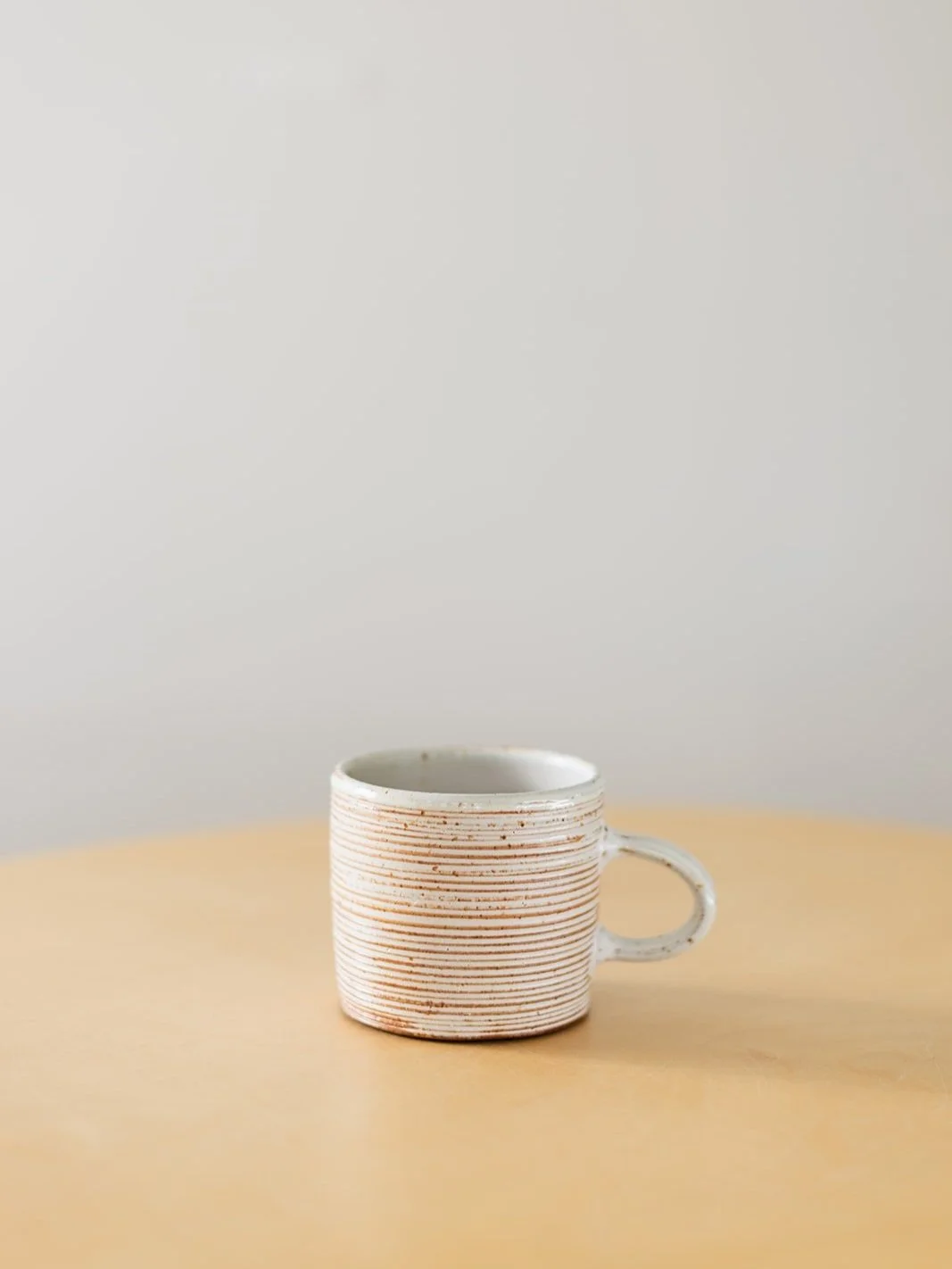 Soda Fired Carved Mugs