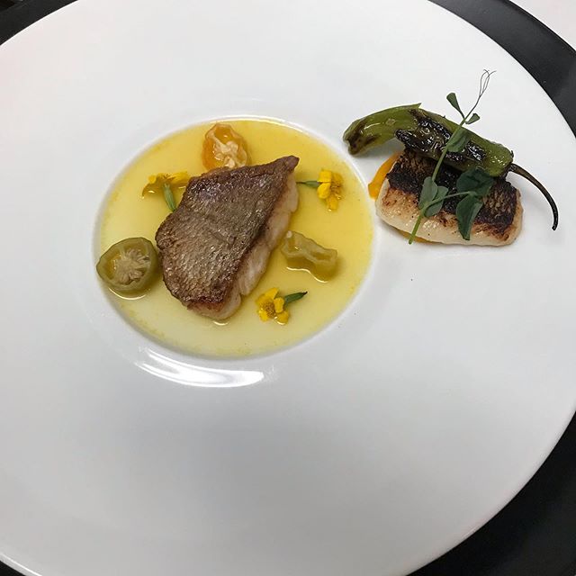 Sea bream duo, pumpkin pur&eacute;e and consomme, shishito peppers, marigold flowers