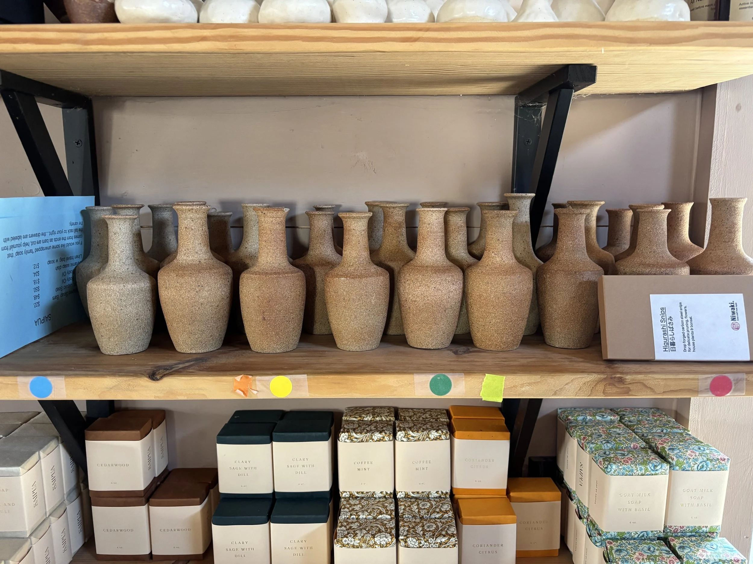 shelves of bud vases.jpeg