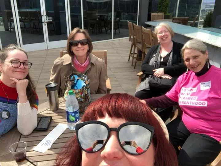 Annie Porche, Sharon Brown, Jessie Birkeland, Cindi Huss, and Carleen Claybaker take a short break between legislative appointments.