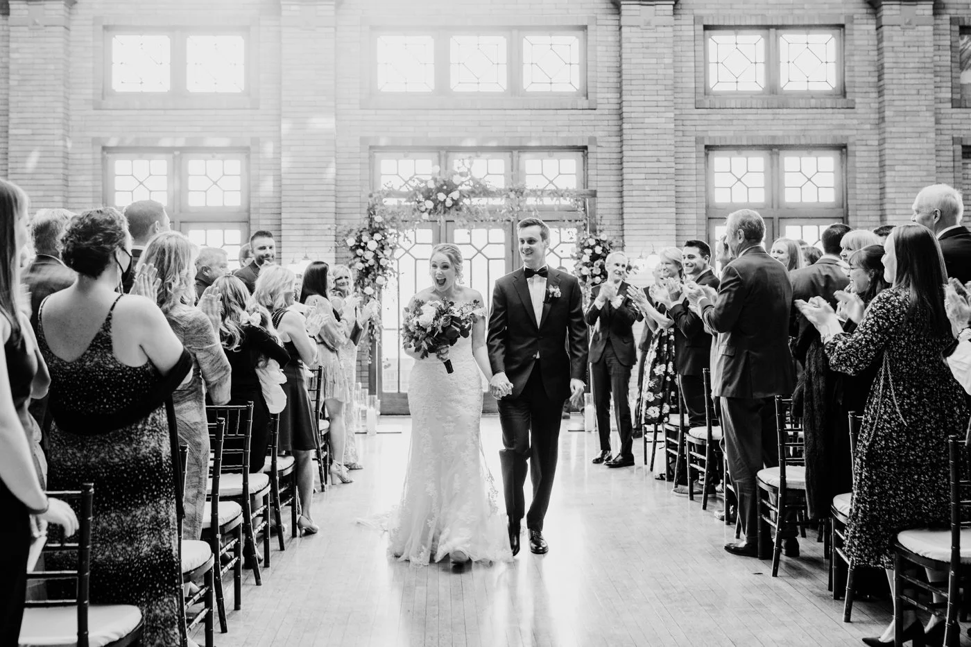 Bride and groom exiting their wedding ceremony