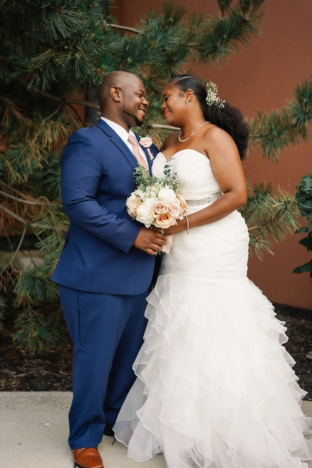 Photo: M28 PhotographyMy brother Joseph and new sister Shameka pictured after the long wedding process but an amazing wedding!