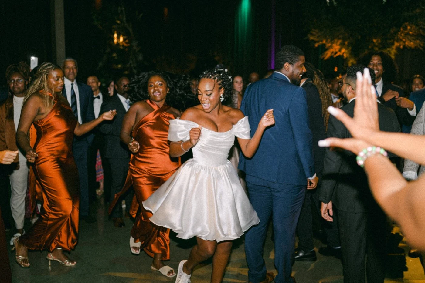 Bride wearing an Olivia Bottega reception dress